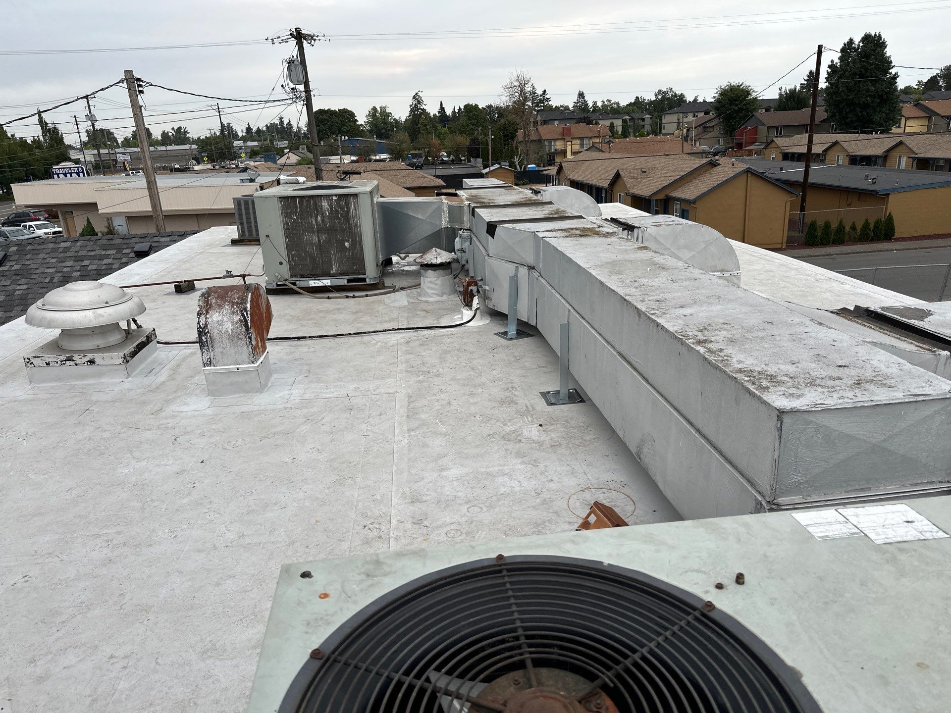 Summit Grey Lum Yun Salem Oregon Commercial Roof by Orezona Building & Roofing Company, Inc.