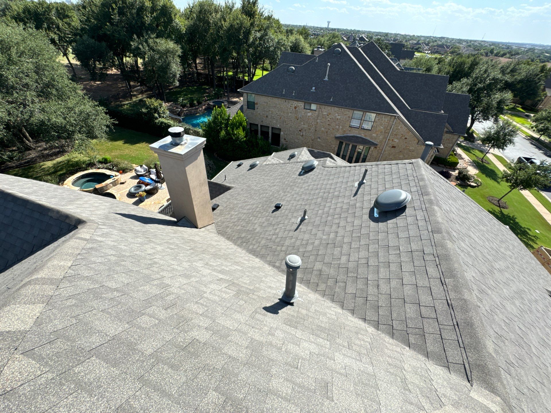 Residential Roofing Installation using IKO, Cambridge in Weathered Wood by Oakwood Roofing and Construction, LLC