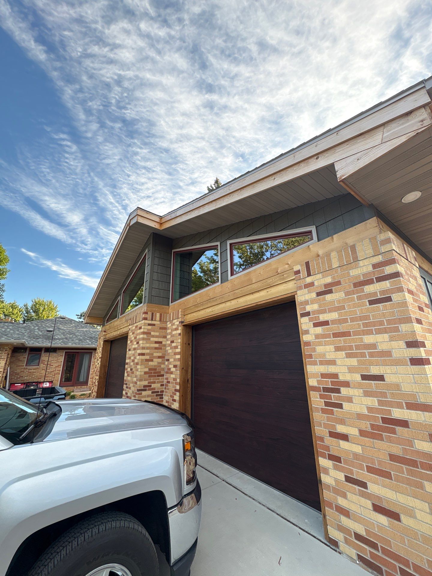 Exterior Siding and Brick Painting for Sioux Falls Garage by Select Painting, Coatings & Garage Cabinets