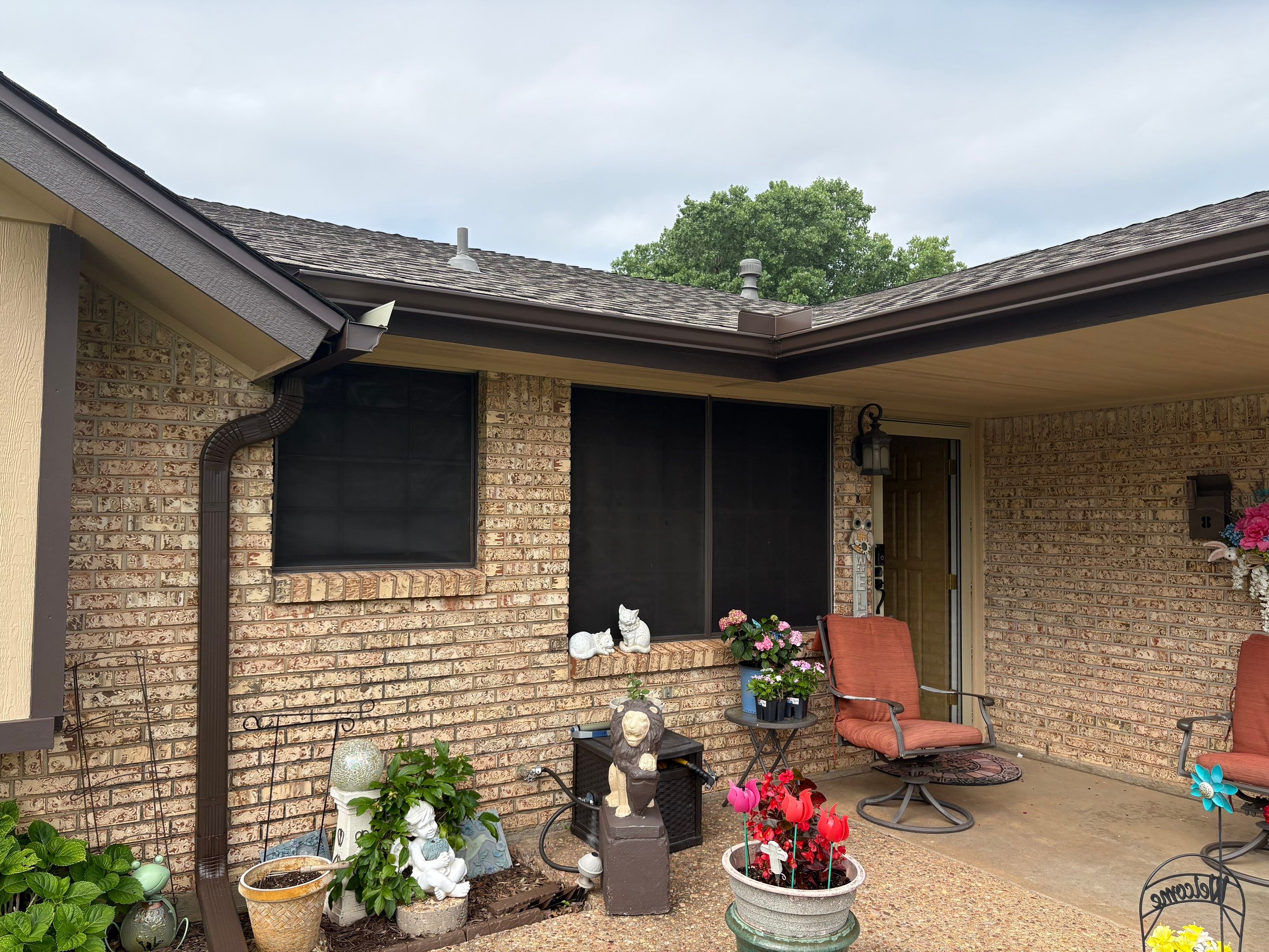 roof replacement & gutter installation in Moore by McCann's Roofing and Construction