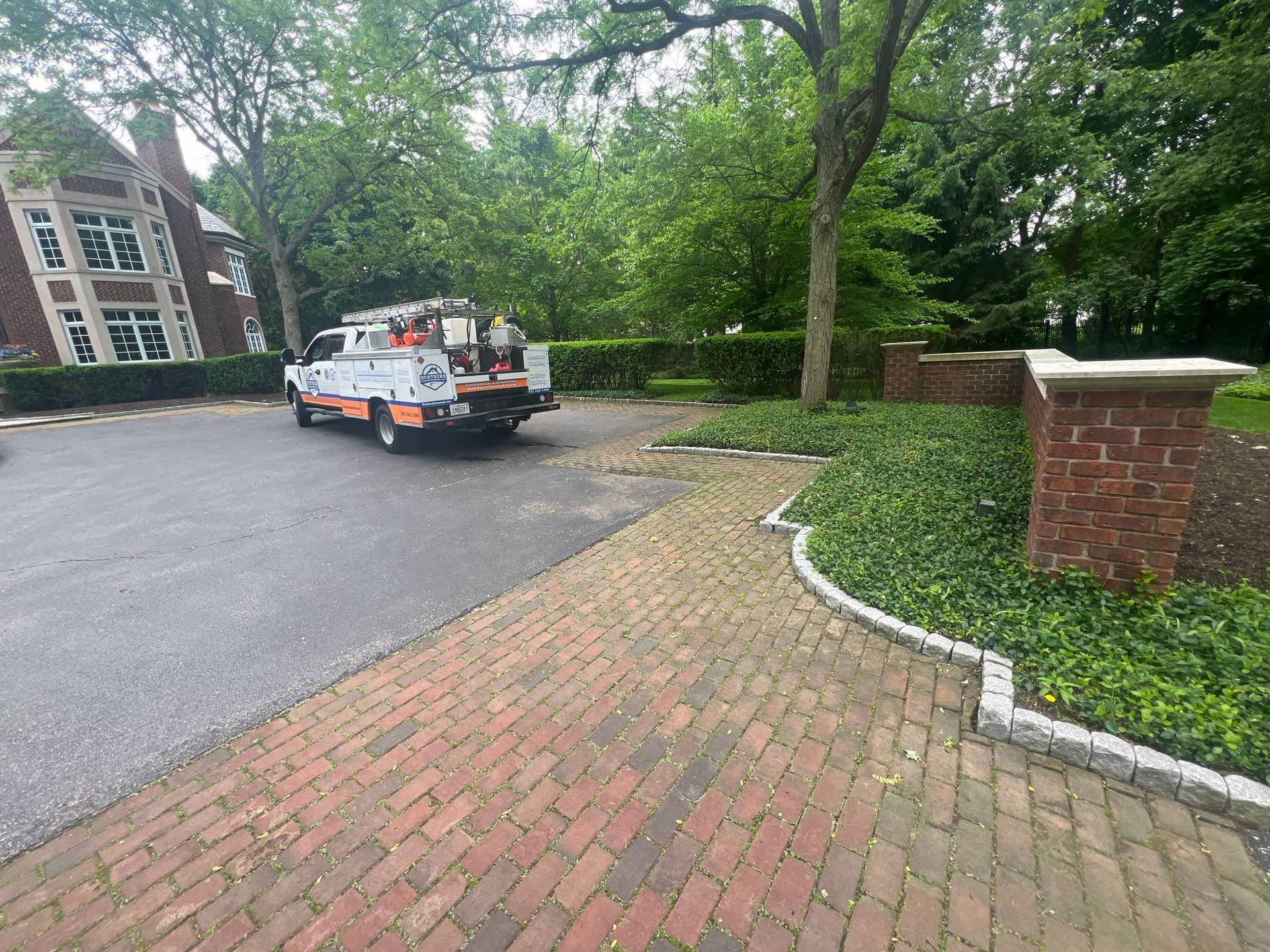 Brick paver clean, sand and seal.  using Algaecide, soft wash soap by Northern Power Washing LLC.