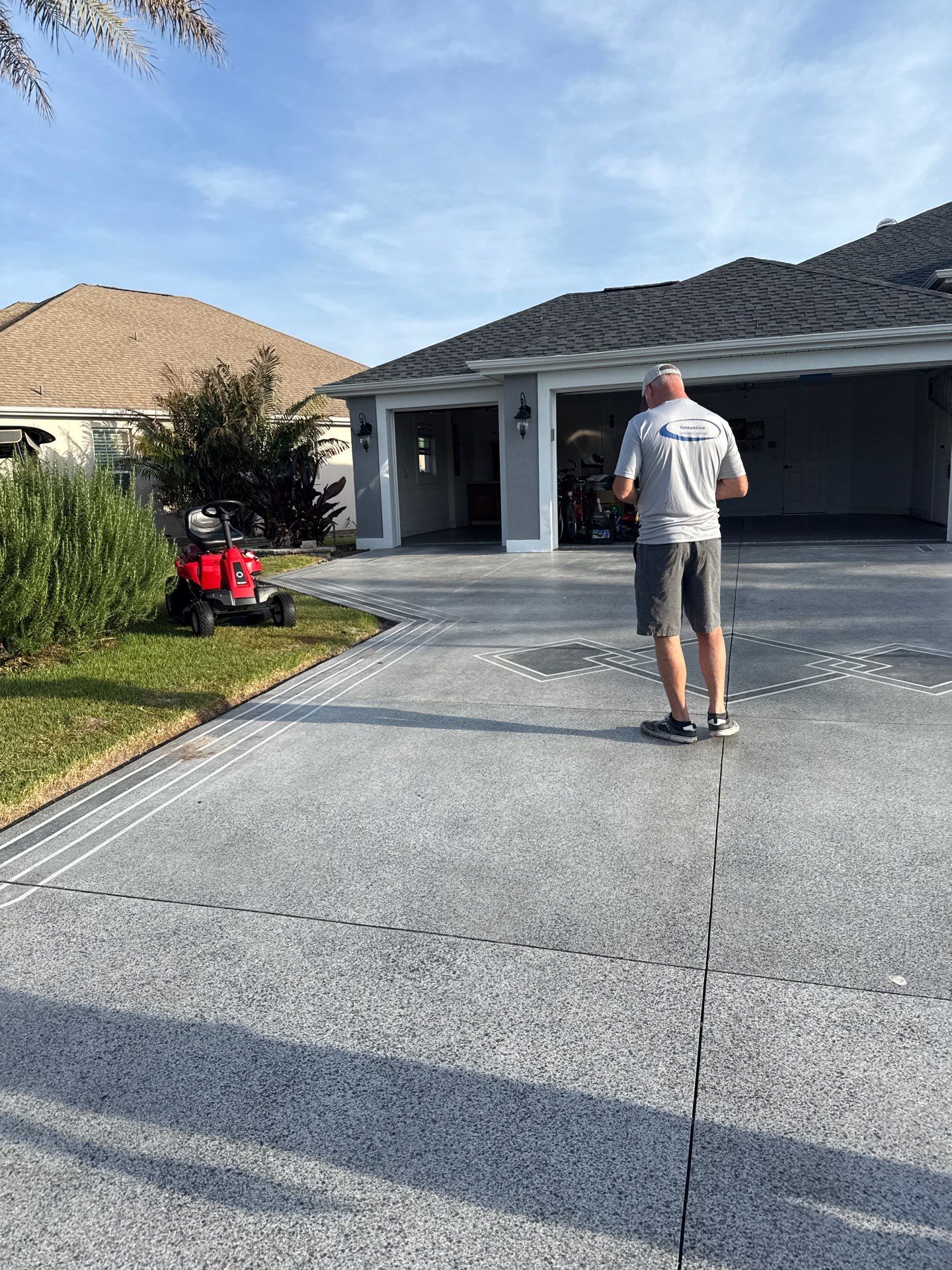 Driveway & Sidewalk Slatestone with Silvercreek borders by Innovative Concrete Coatings 