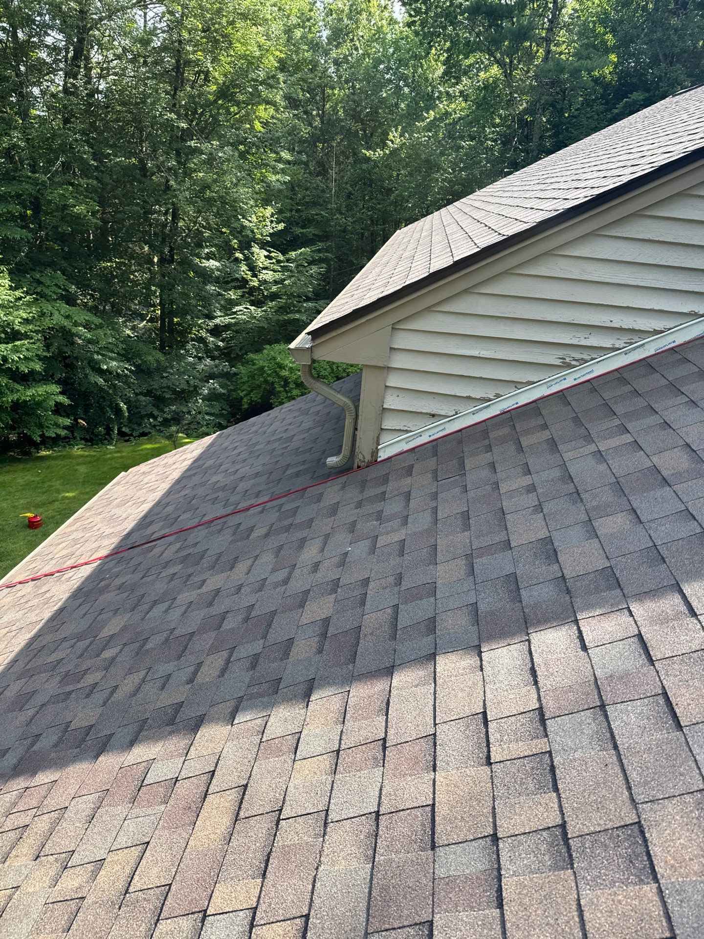 Amherst NH Roof Replacement with Owens Corning Duration Teak Shingles and Velux Skylights by Compass exteriors