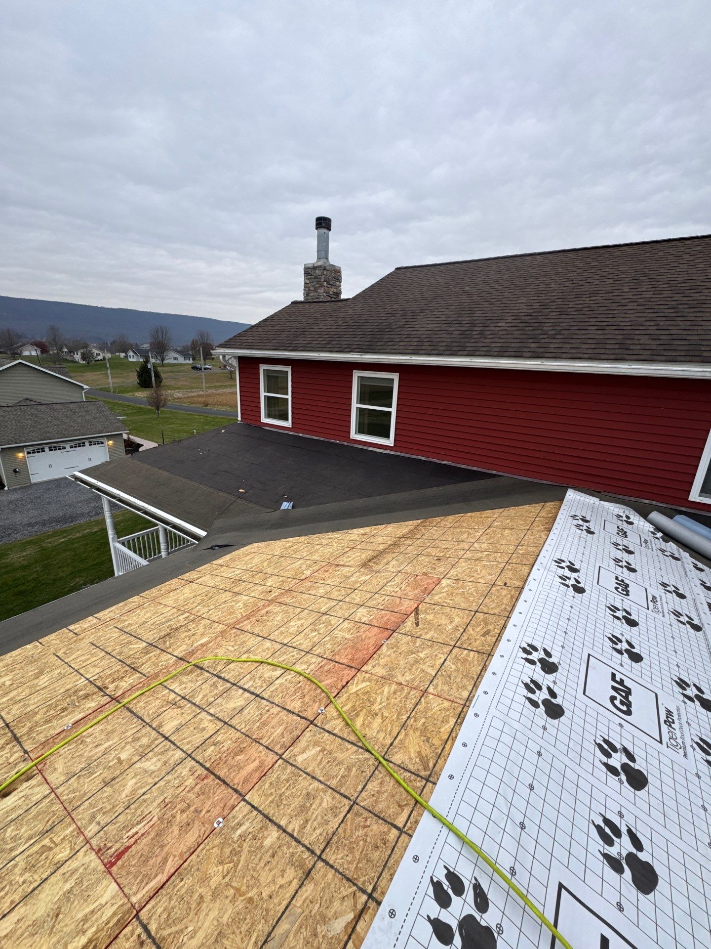 Covered Deck Addition With Custom Gable Roof in Tower City by Esh Builders
