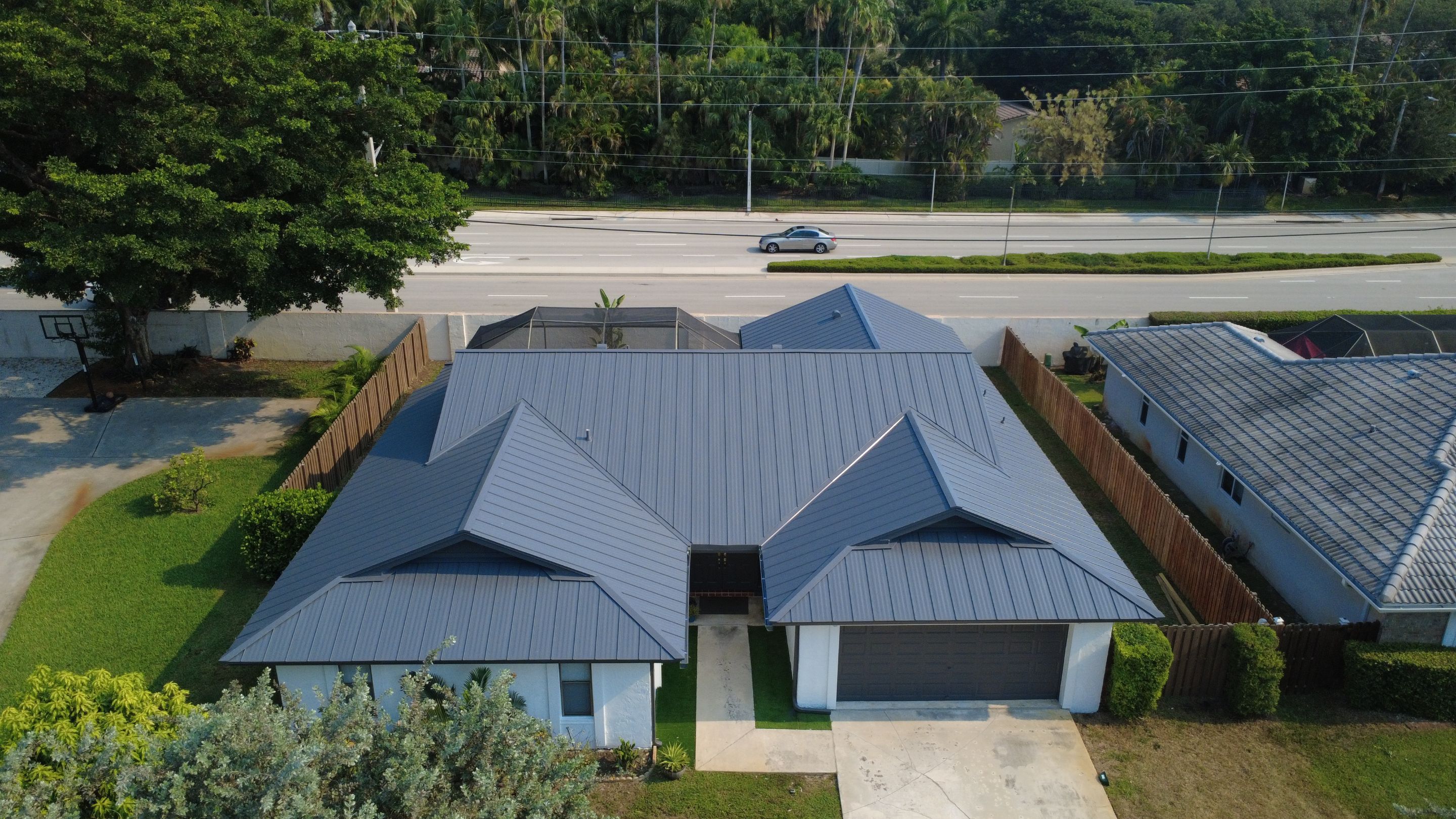 Residential Roofing Installation using 1" Nail strip metal roof by BLUES BROTHERS CONSTRUCTION CORP