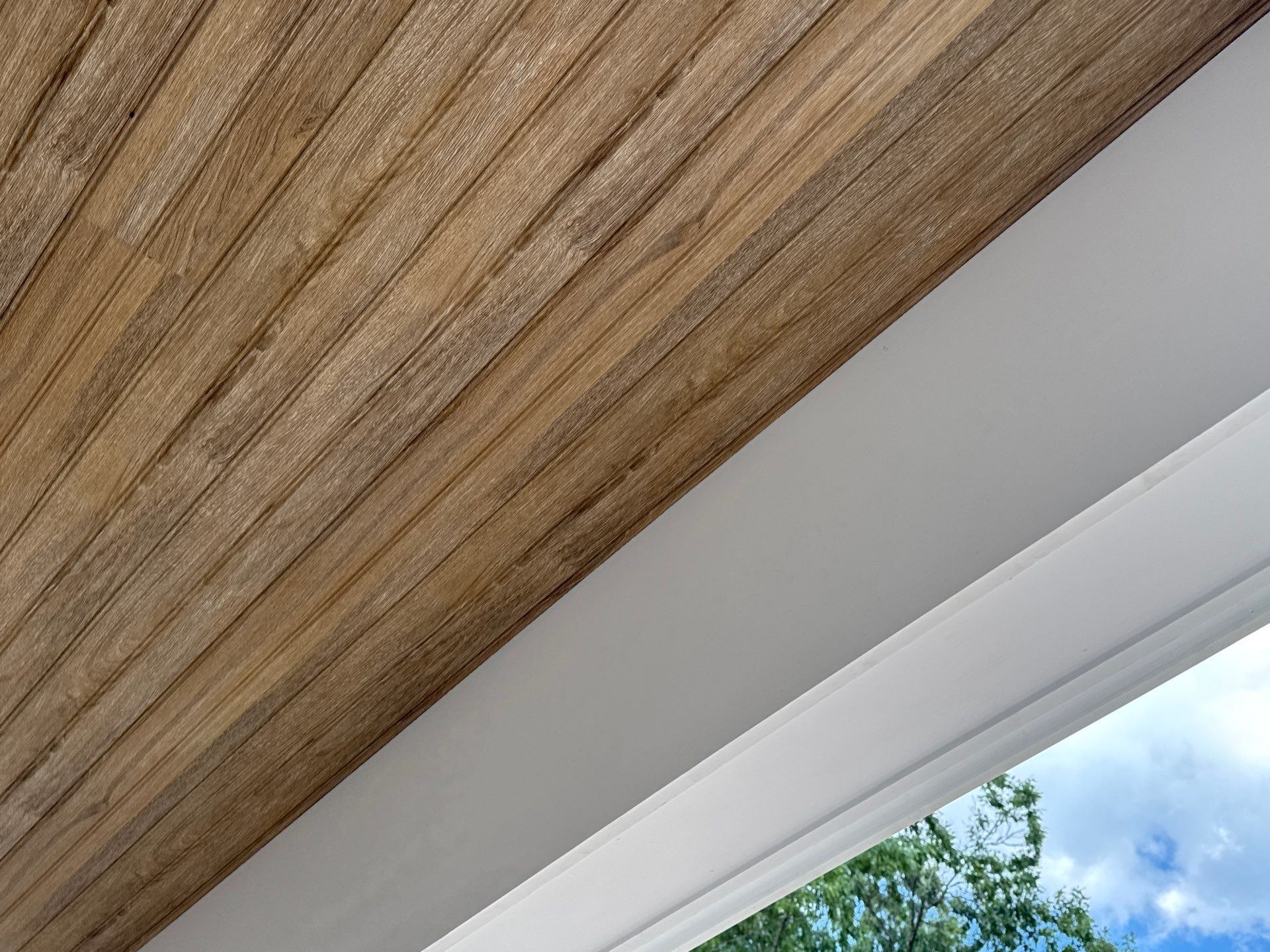 Two-Story Custom Home With Board and Batten Siding by Cade Construction