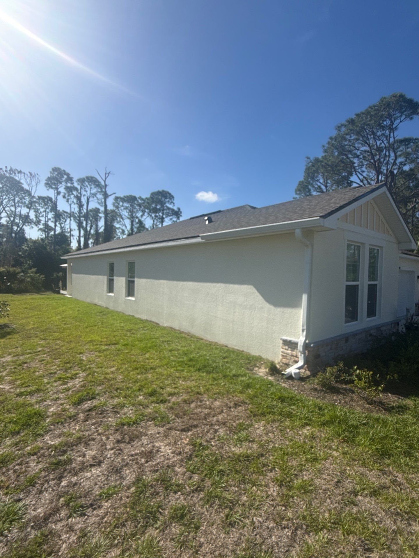 6-inch K-style White Seamless Gutters with Downspouts in North Port, FL by Gutter Professors