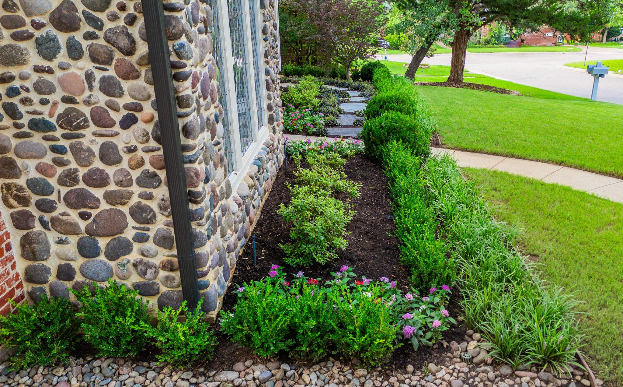 Southern Charm: Revitalizing a Cottage Garden by Complete Exterior Solutions