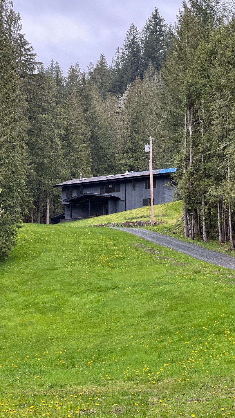 Residential ReRoofing Installation using 12" Prolok metal by Top Notch Roofing Inc