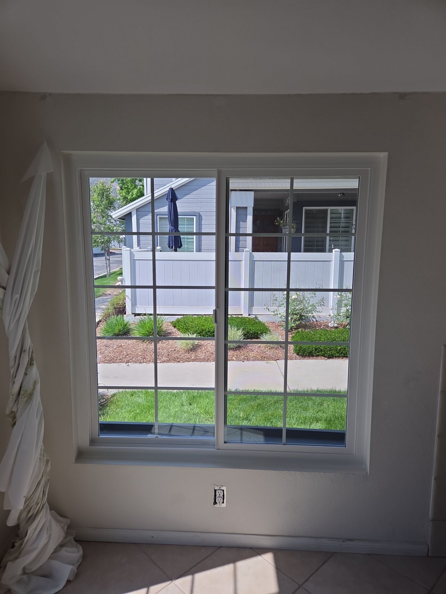 Window Installation using Milgard V300 Trinsic with grids by American Window Company