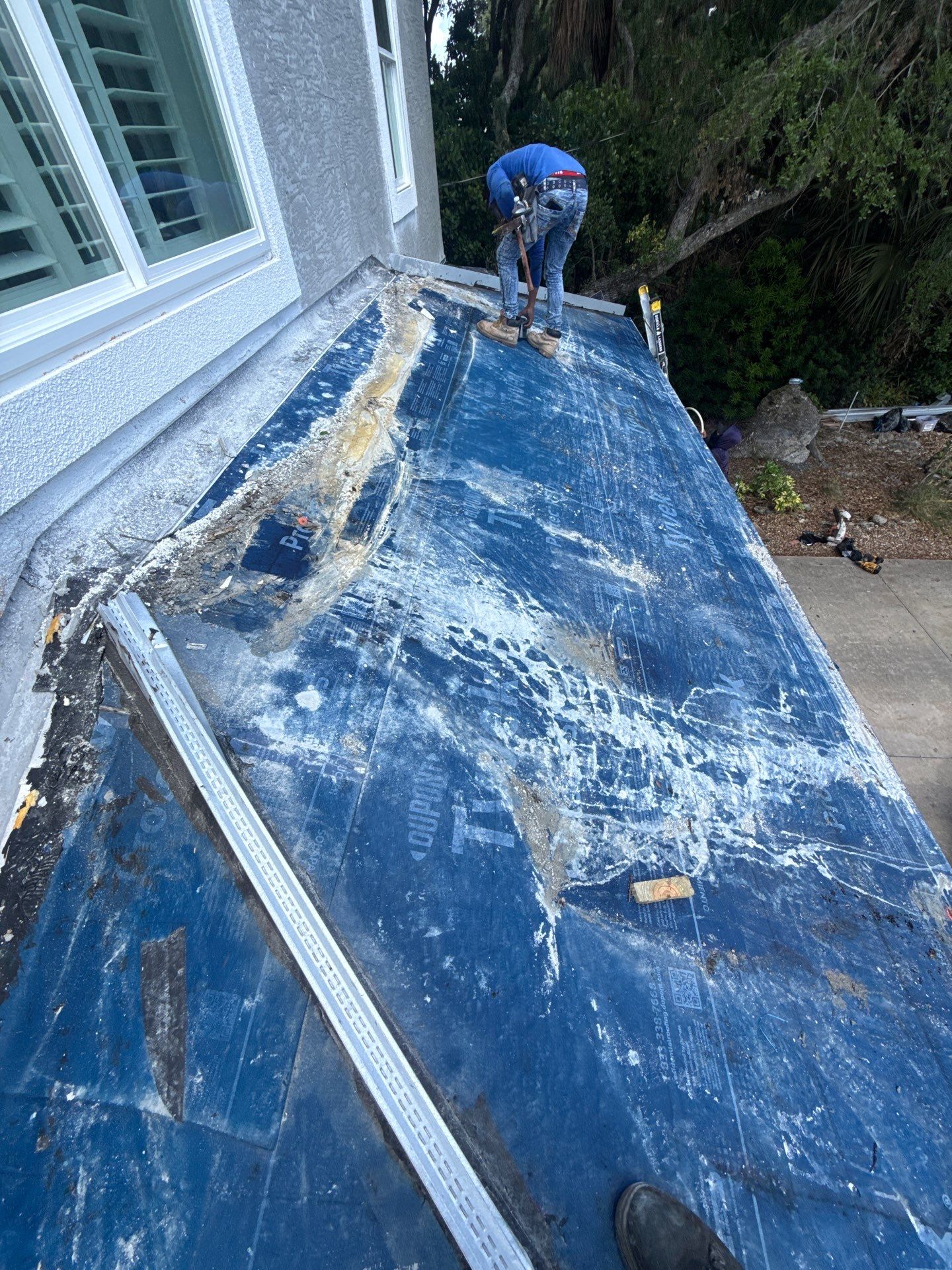 Flagler Beach Residential Tile Roof Replacement with Dark Barrel Tiles by Fortified Roofing Solutions Corp.