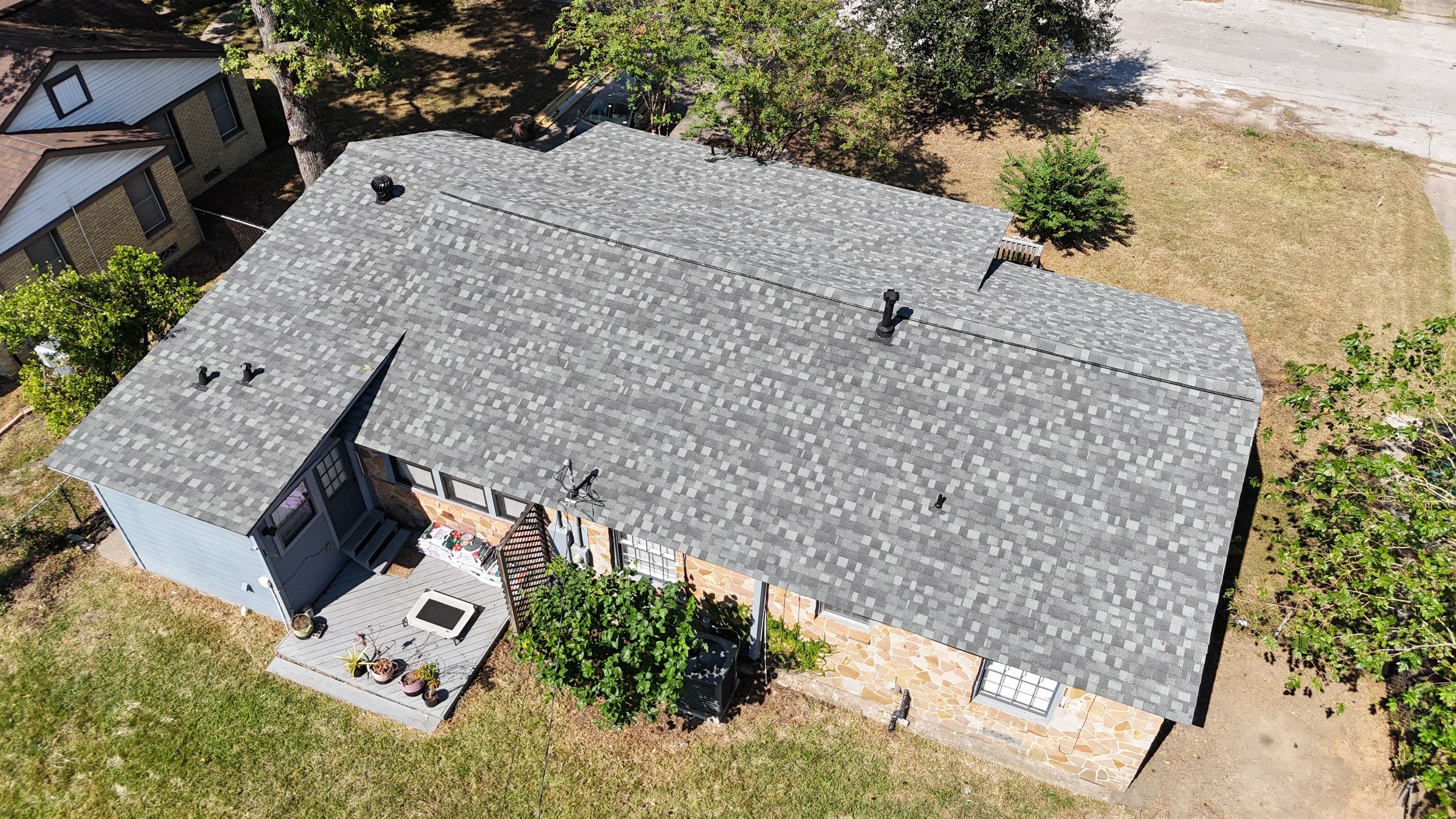 Roof Replacement after a 90-foot tree fell on it! by Core Four Roofing