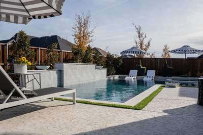 Pool with Large Sun Shelf and Spa