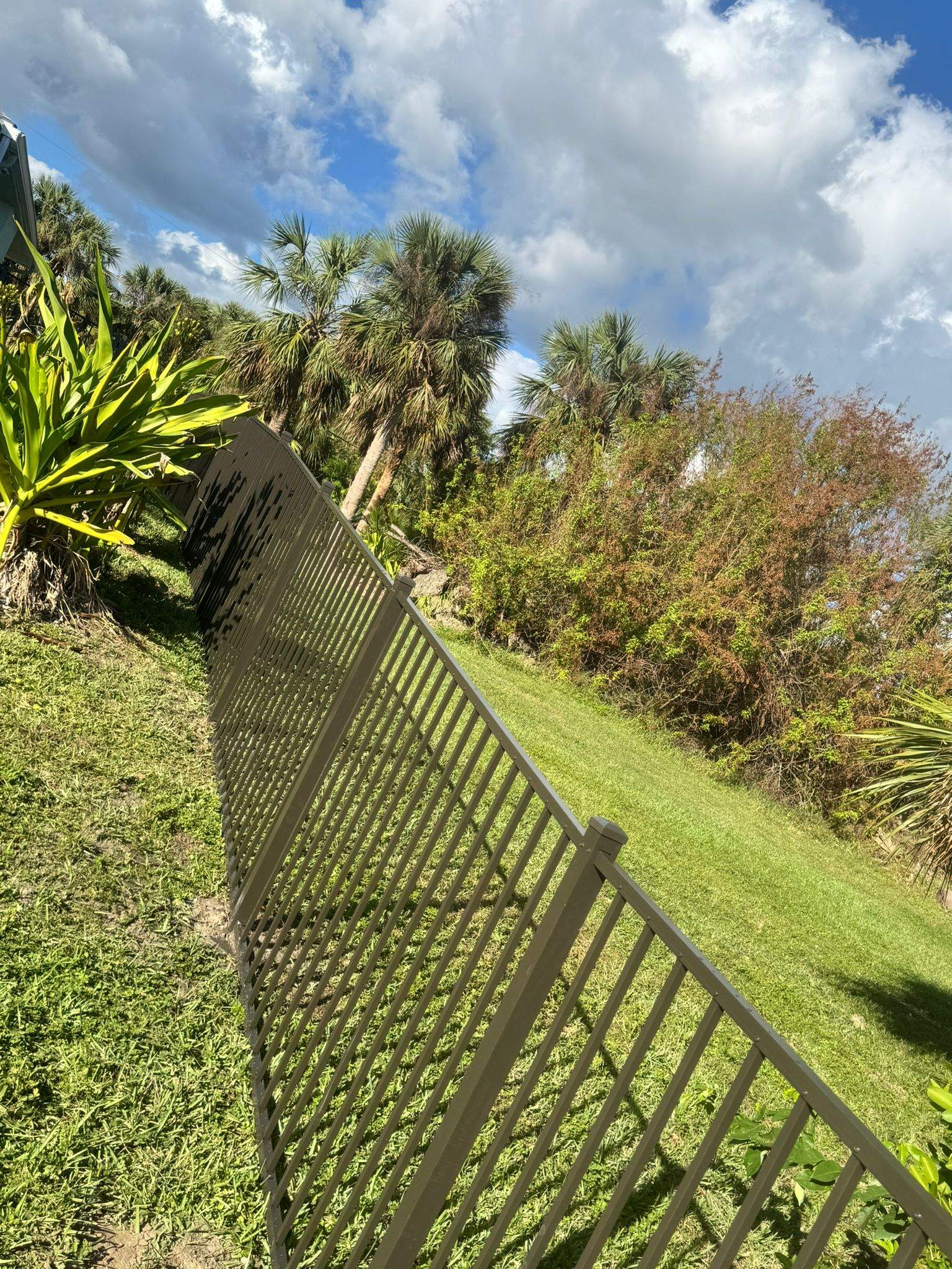 Bronze Aluminum Picket Fence Installation in Port Charlotte by True Fence LLC