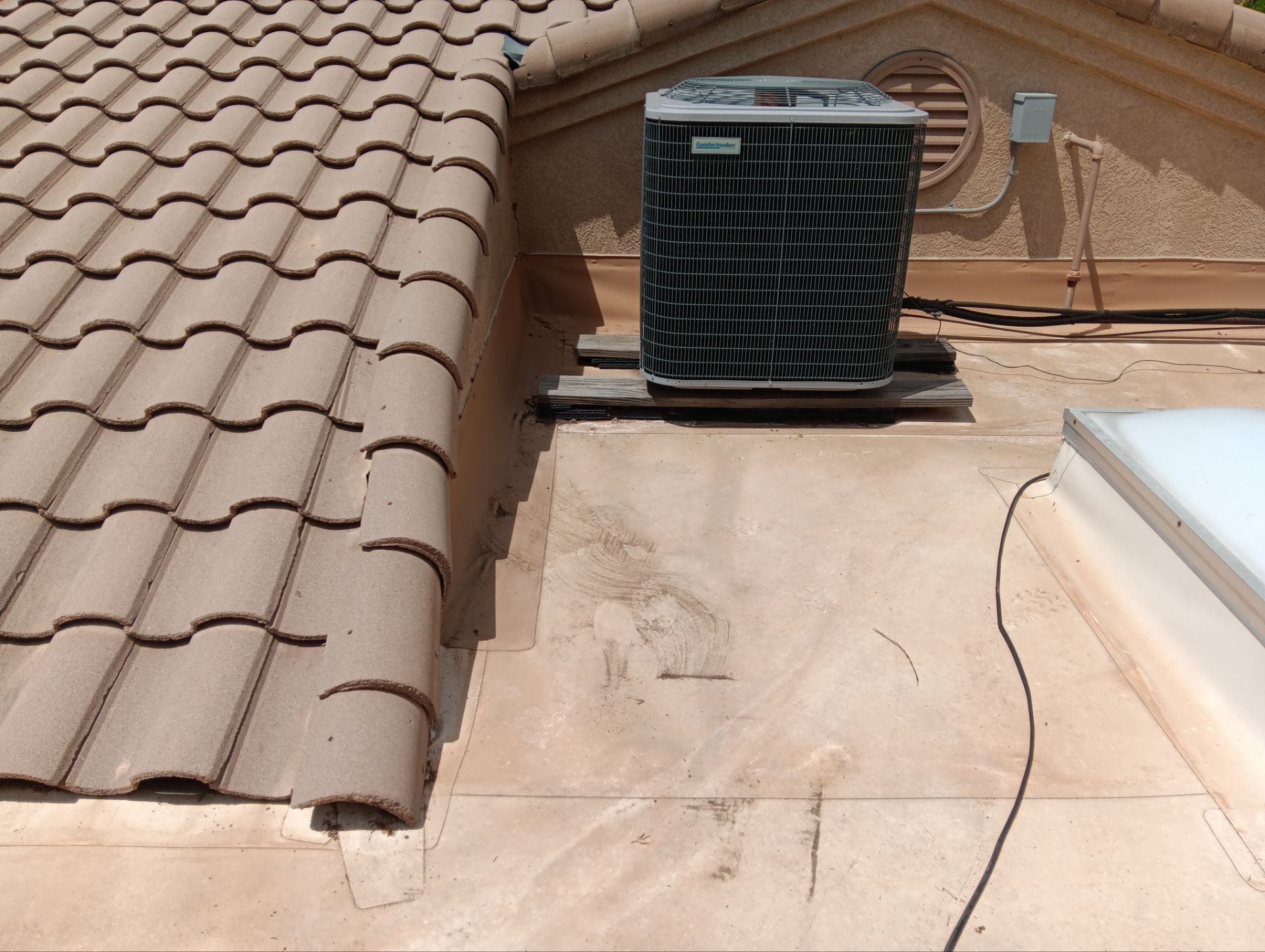Tile and TPO Roof Maintenance and Gutter Cleaning in Sandia Heights by Doyle Roof Masters Inc