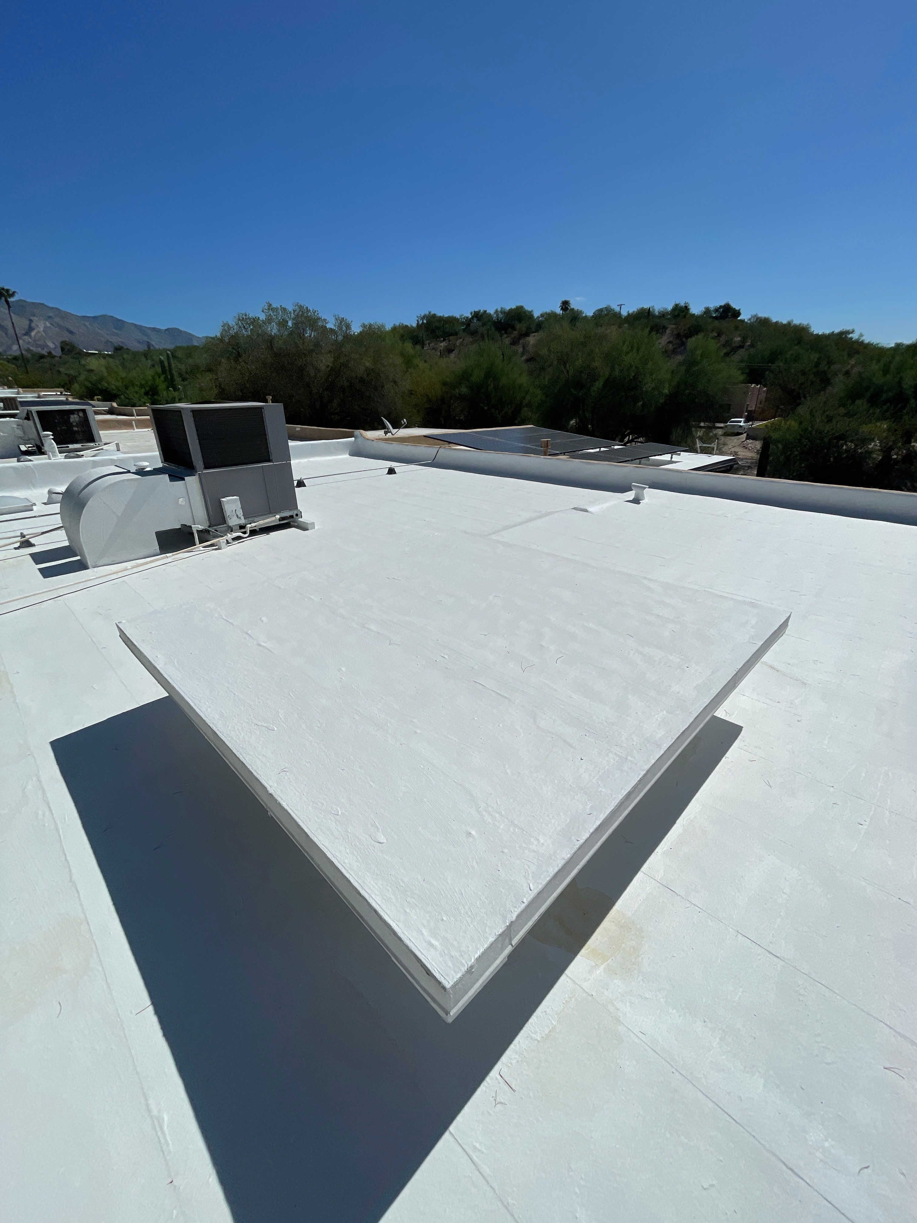 Tucson Residential Low Slope Roof Restoration and Solar Installation by West Coast Roofing AZ