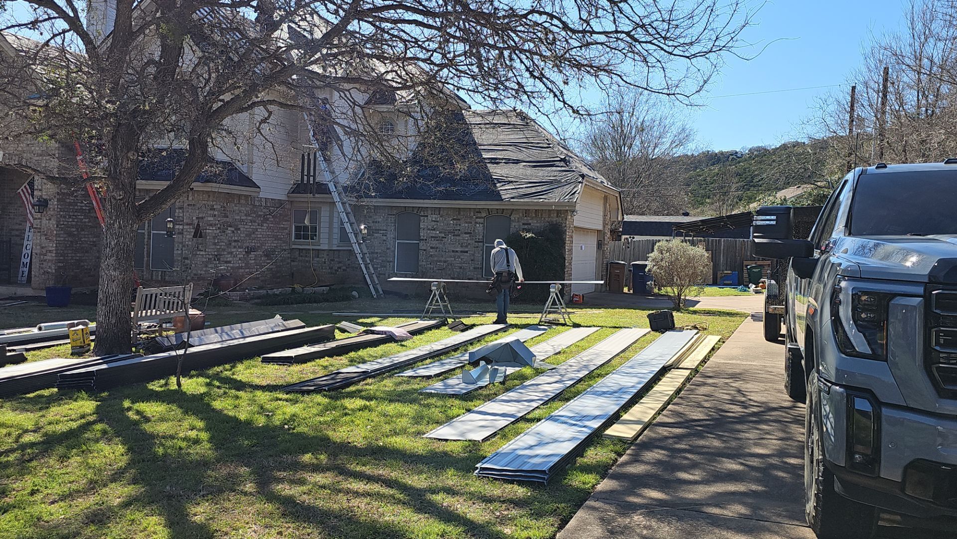 Residential Roof Replacement using 24 GA Double-Lock - Matte Black by Action Exteriors Austin