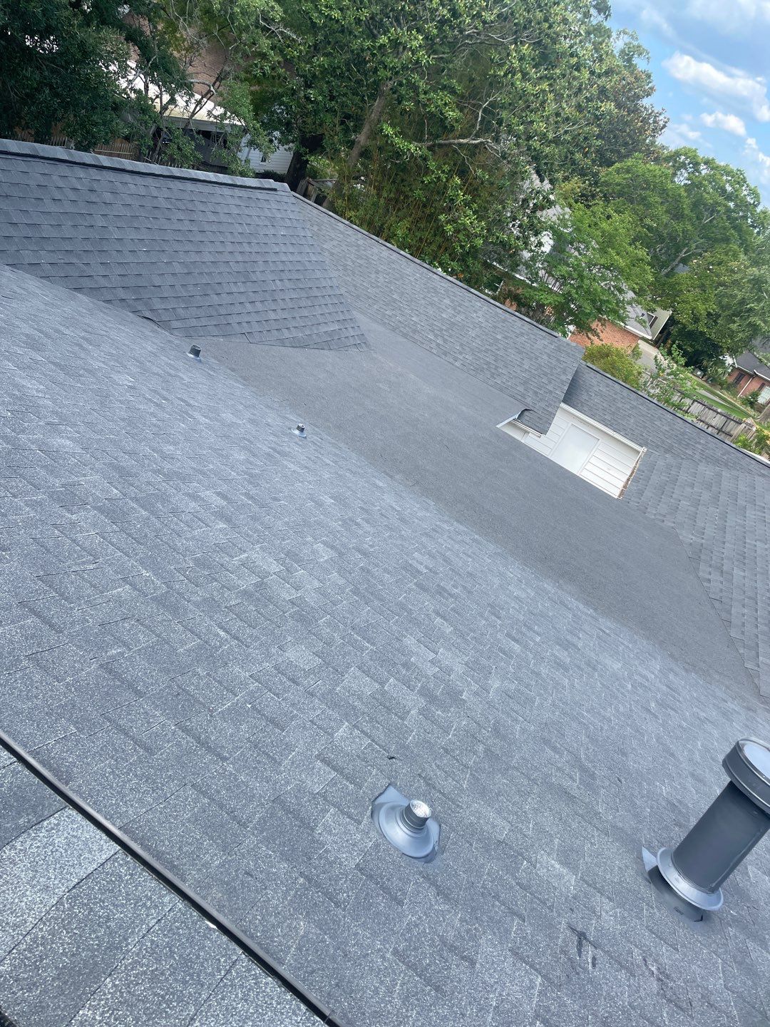 Residential Roofing Installation using Roof Replacement by American Roofing & Construction LLC