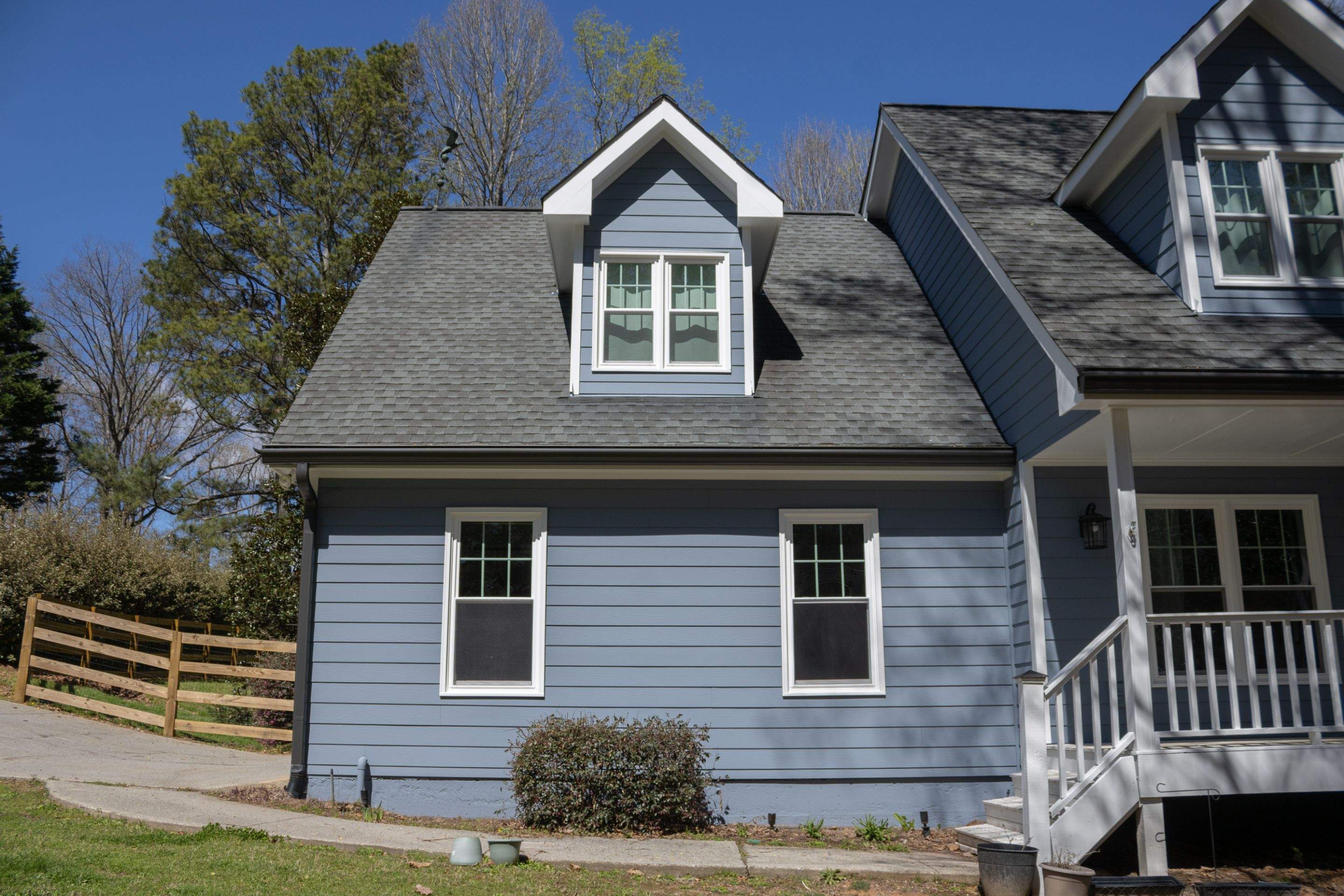 Marietta, GA Full Siding Replacement, 30+ Window Replacements, Screened-In Porch to Sunroom Conversion, Gutter Replacement, and Exterior Painting by Nelson Exteriors