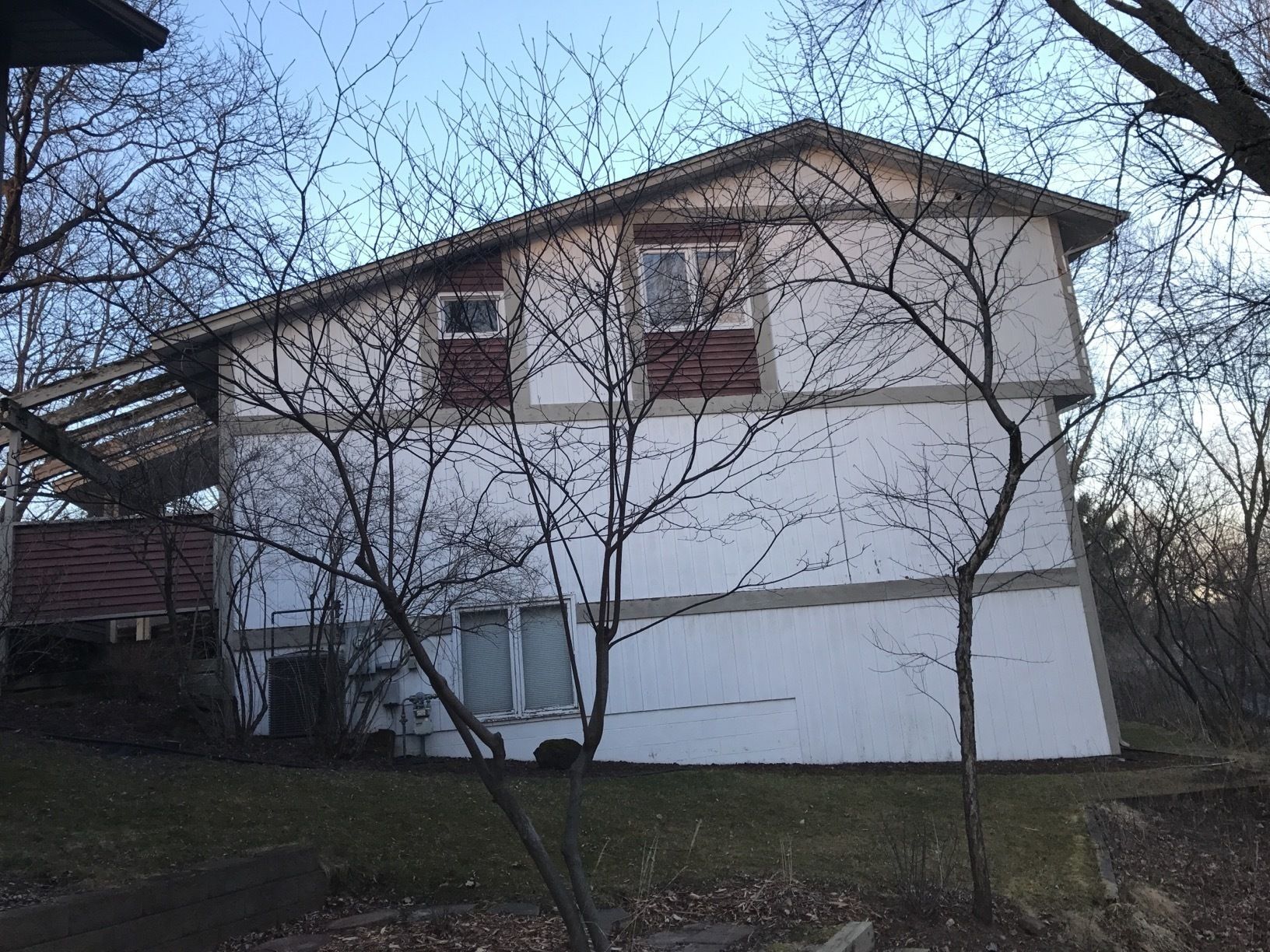 Siding Installation using LP SmartSide and Pella Vinyl Windows by MODERN EXTERIOR SYSTEMS