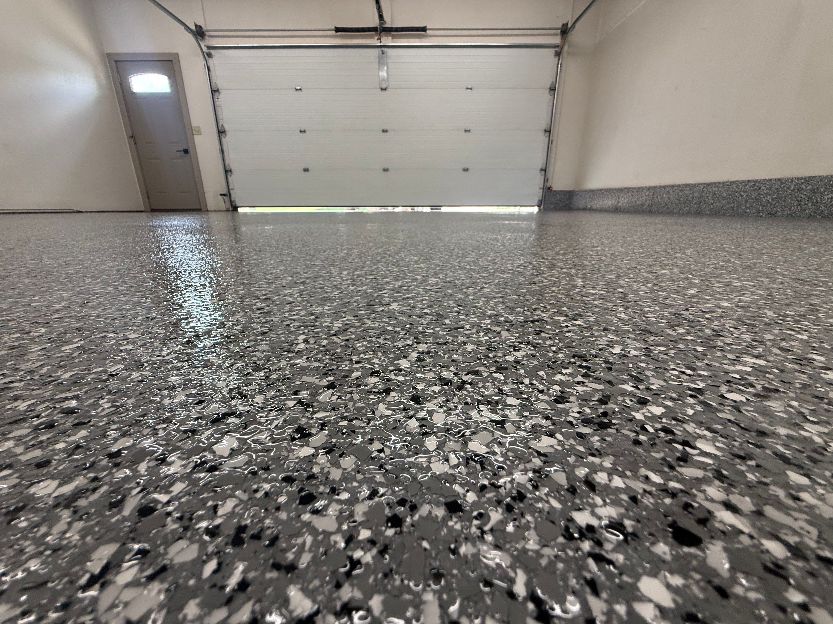 Smoke Flake Garage Floor Coating in Dell Rapids by Select Painting, Coatings & Garage Cabinets