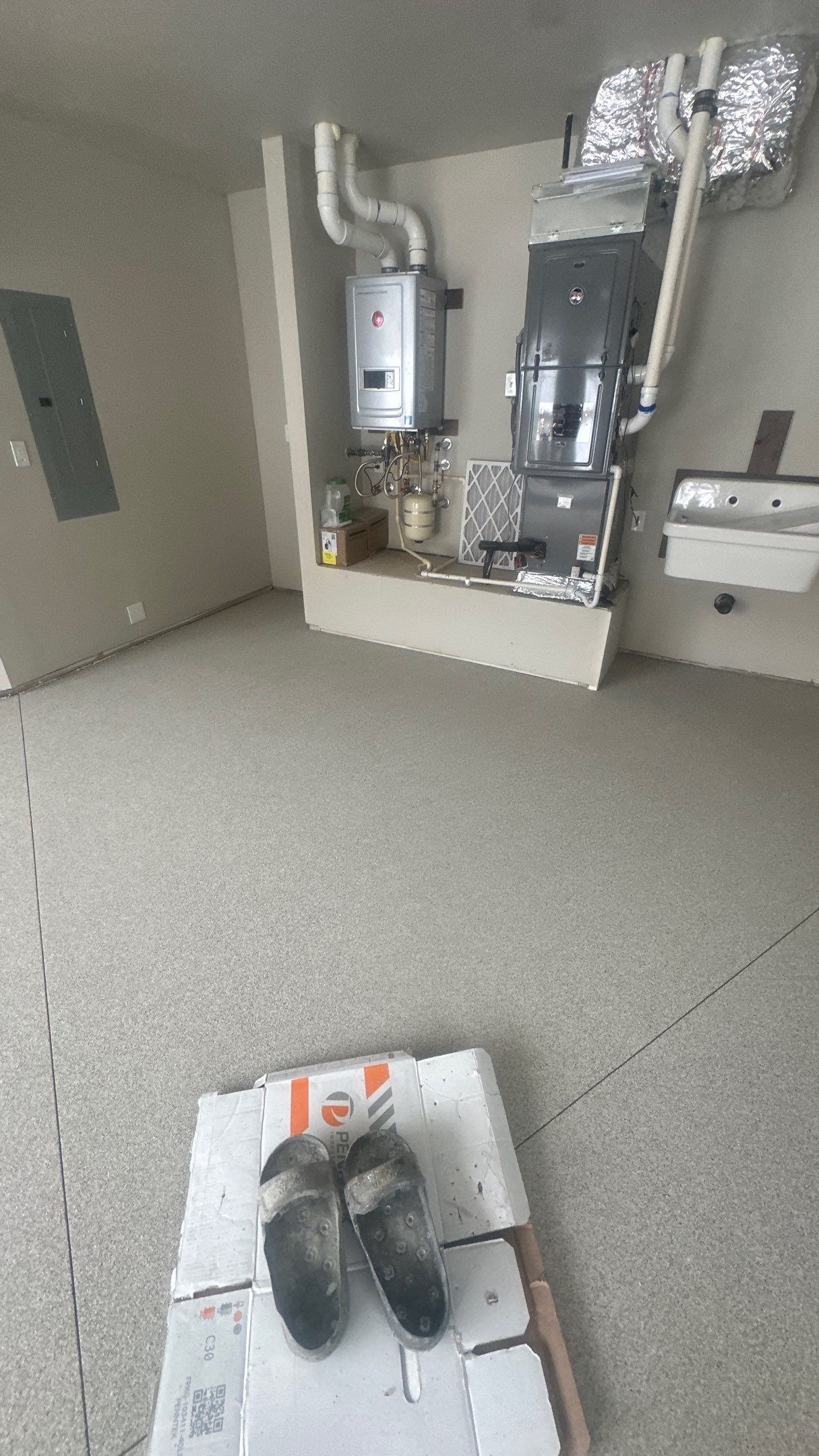 Garage Transformation using Stone/Marble Hybrid by Croc Coatings, LLC