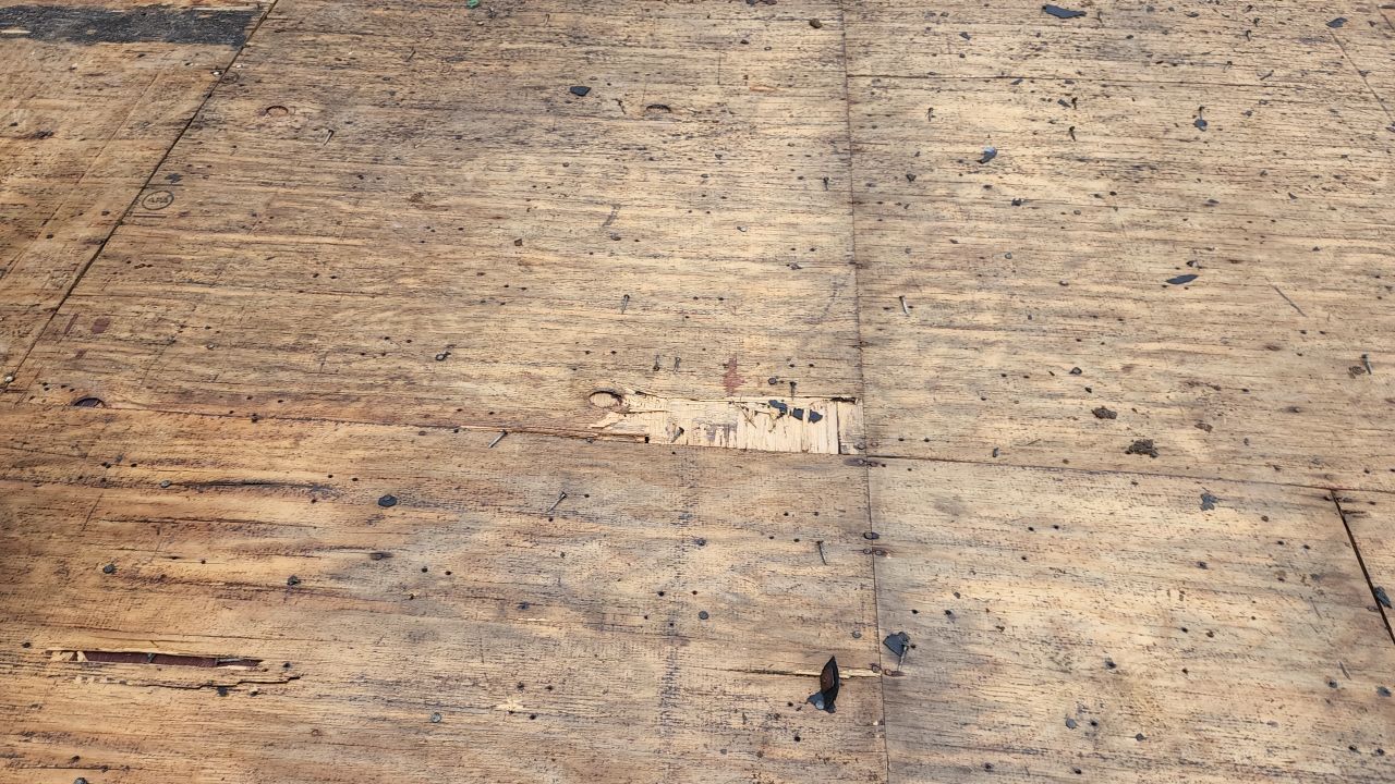 Residential Roofing Installation using 60 mil rubber roof  by Nitro Roofing and Construction