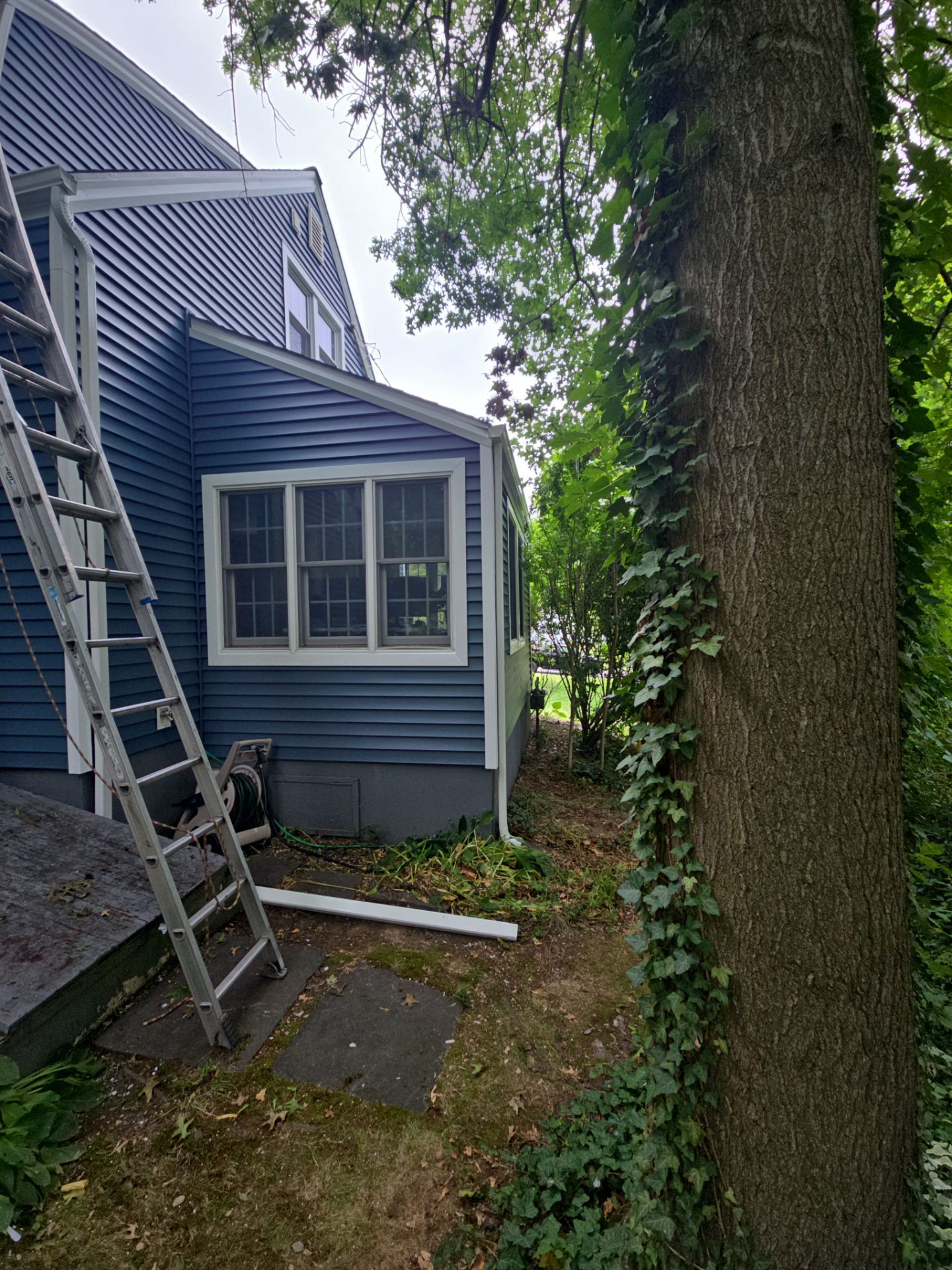 Complete Exterior Estate gray with Pacific Blue Siding by A Plus Exterior