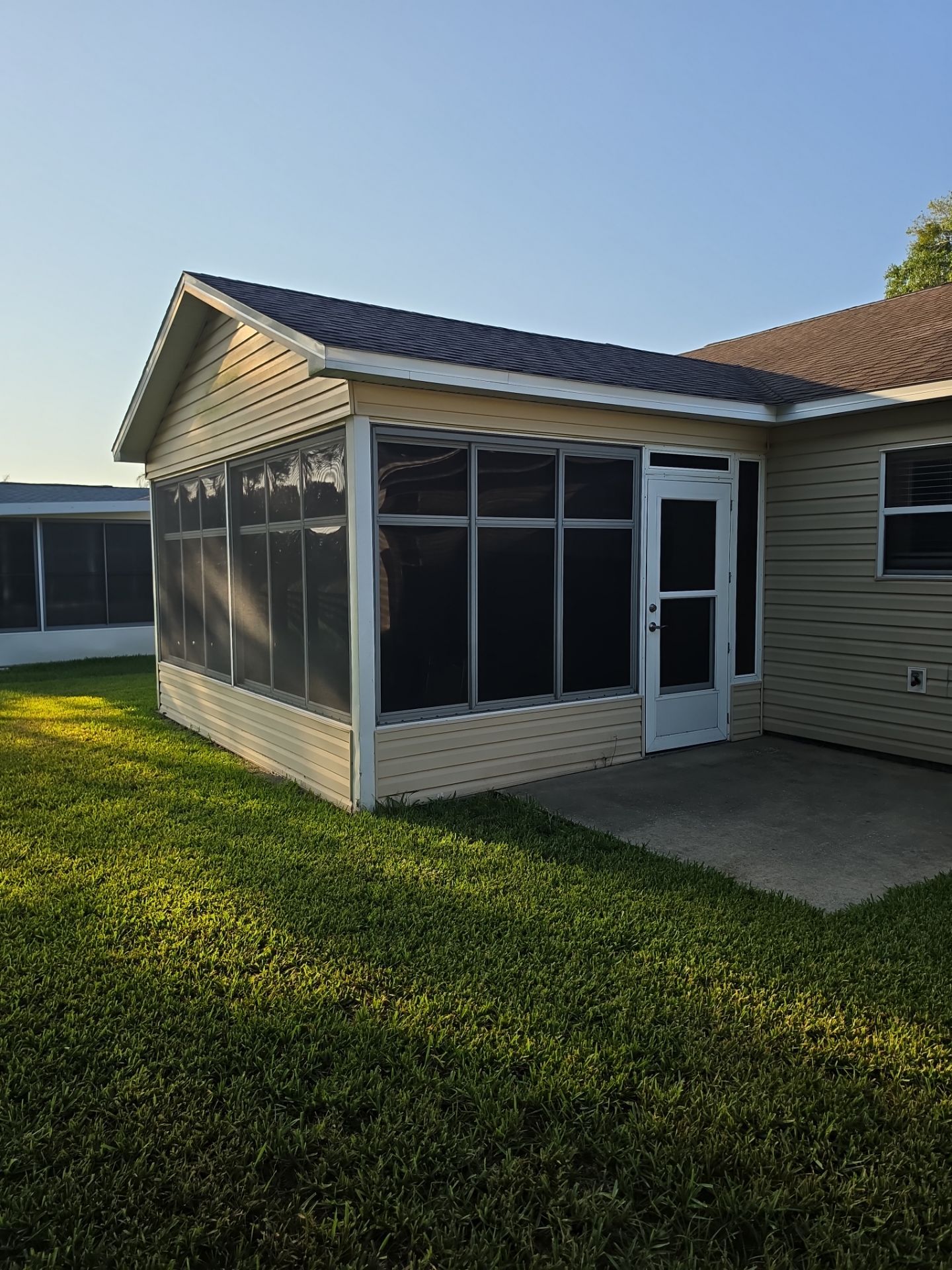 Sunroom Conversion with Alside Windows and Provia Door in The Villages by Windows & Doors Store
