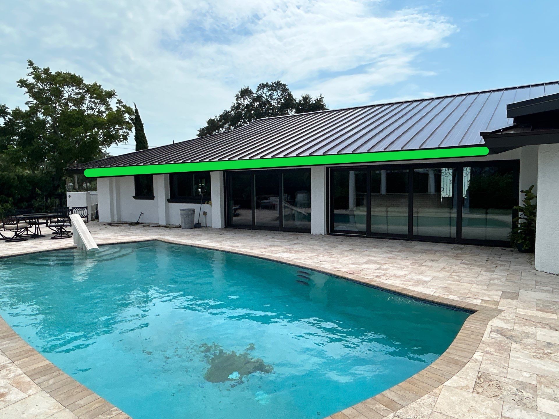 Black Seamless Gutters and Downspouts in Siesta Key FL by Gutter Professors