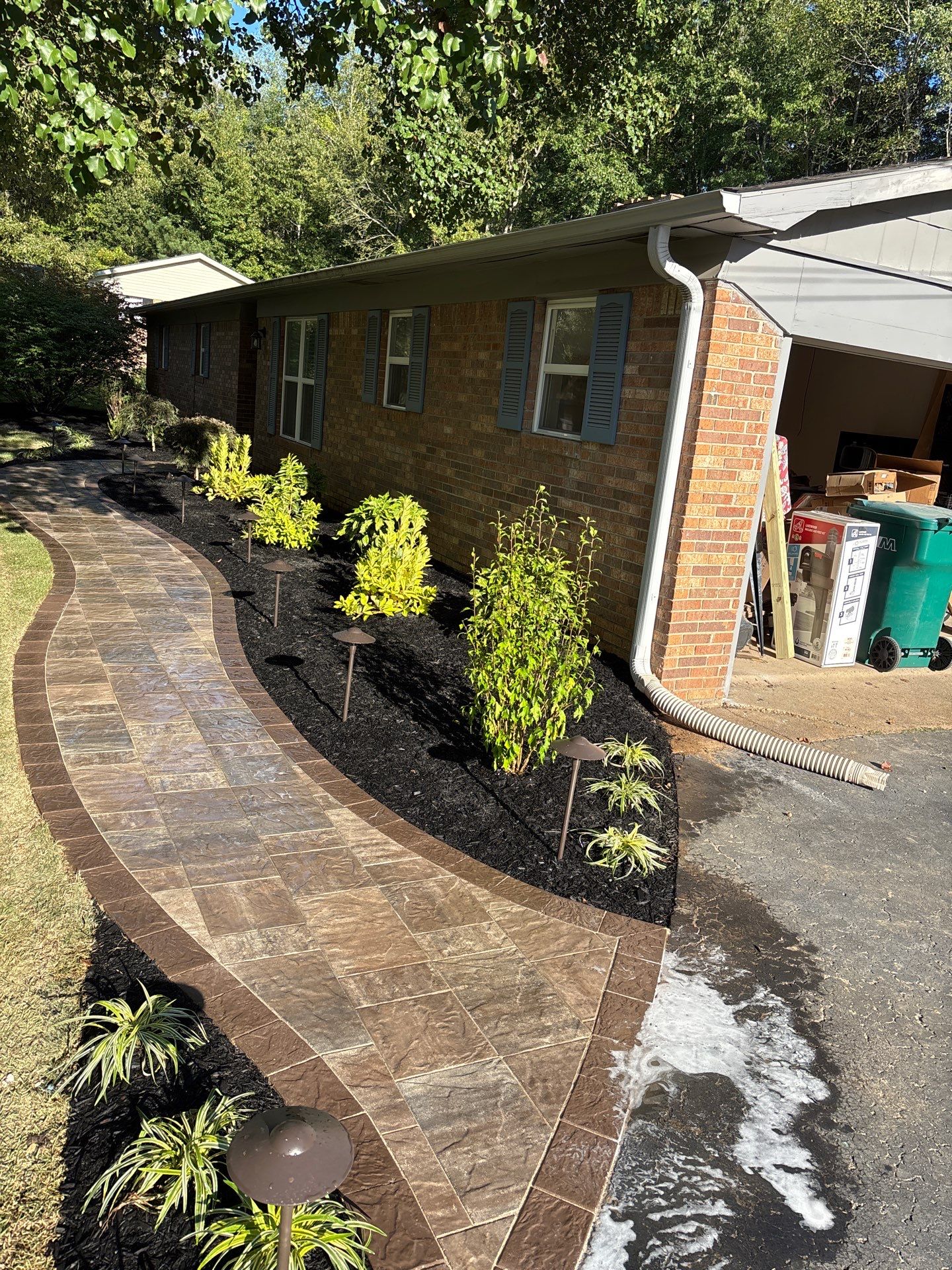 Front Entry Enhancements and a Back Deck Upgrade by Elite Proscapes LLC