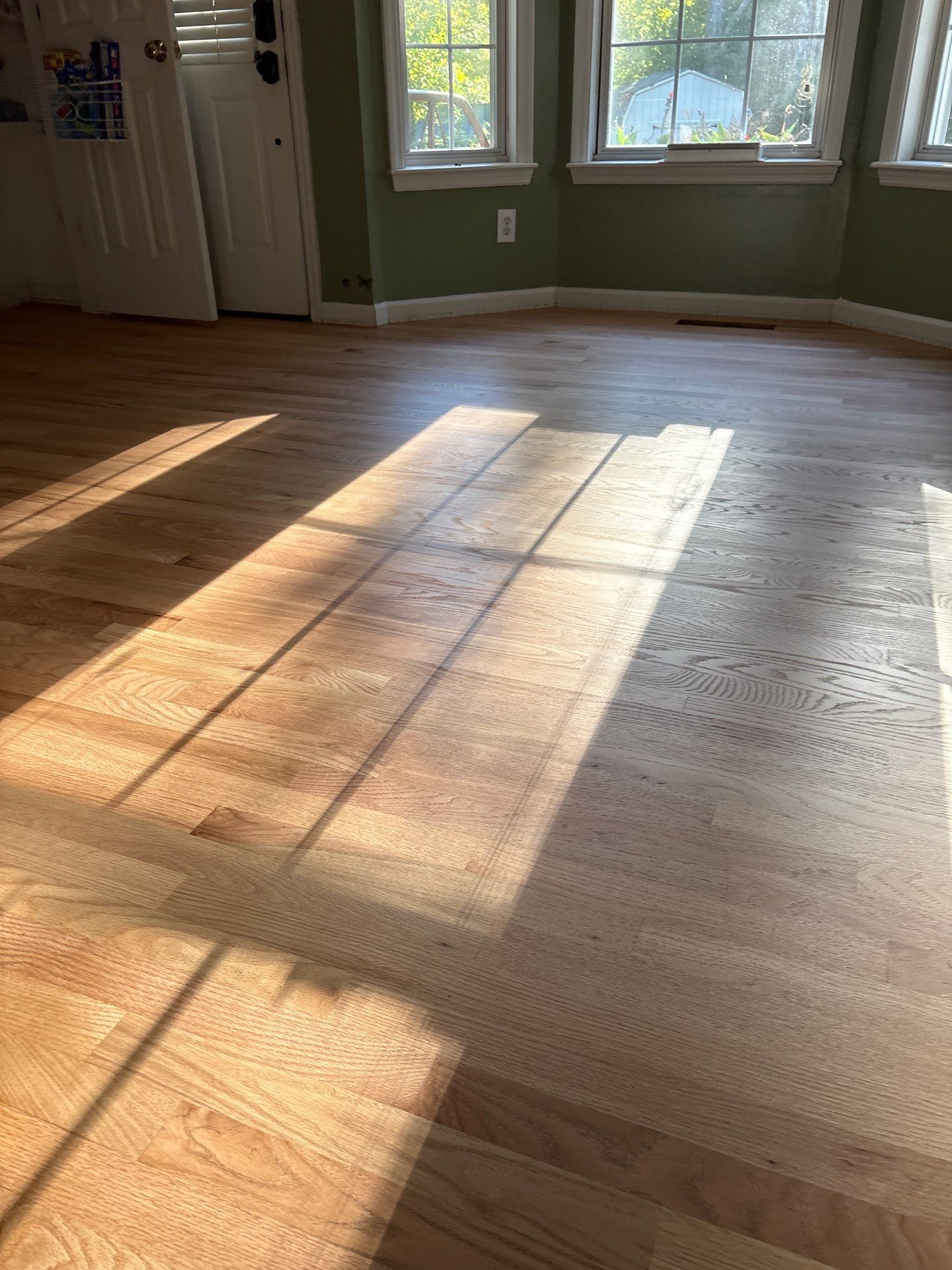 Refinishing an old Bruce prefinished hardwood floor by Accent Custom Floors