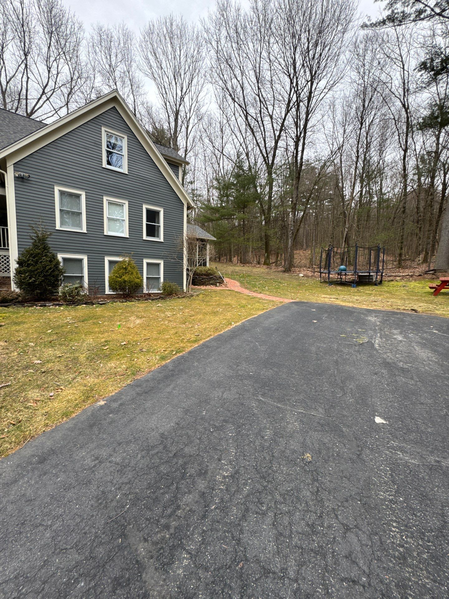 Garage using LP SmartSide Panel Siding by Chagnon Building & Remodeling LLC
