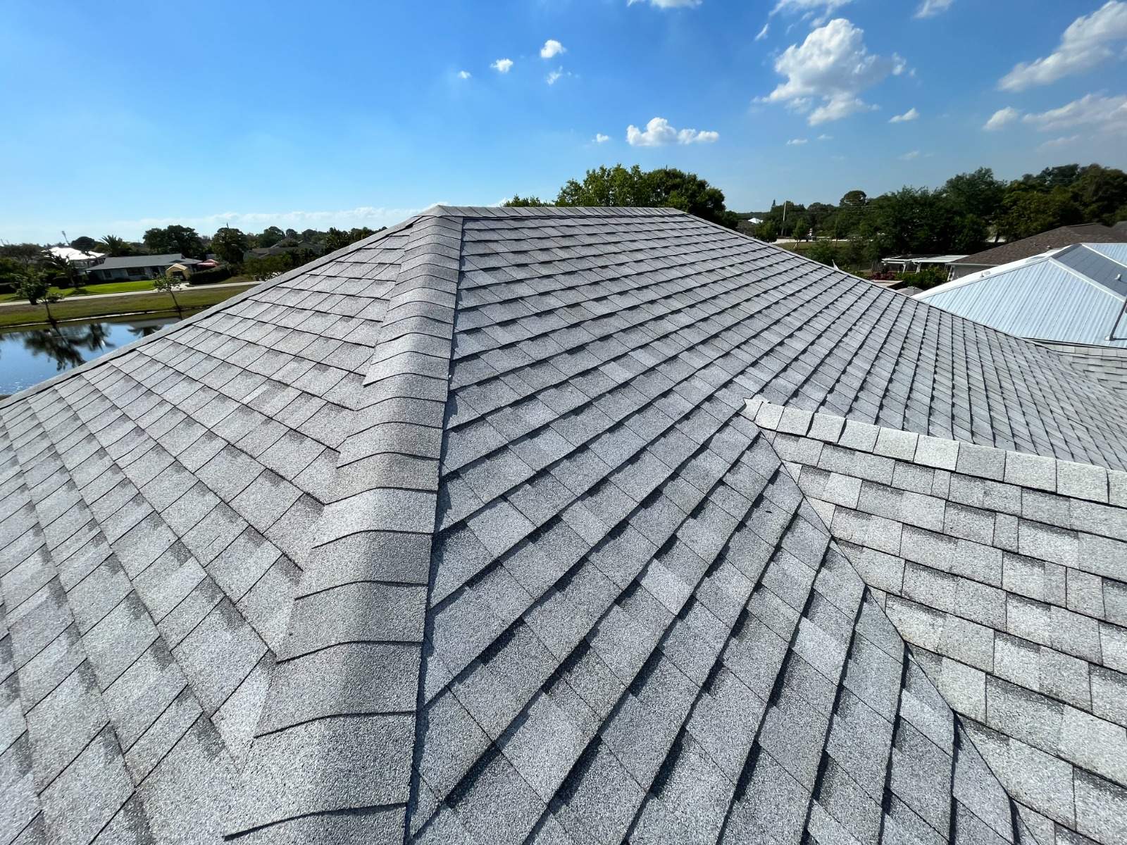 Tamko Heritage Glacier White by Total Roofing System The Metal Roof Experts