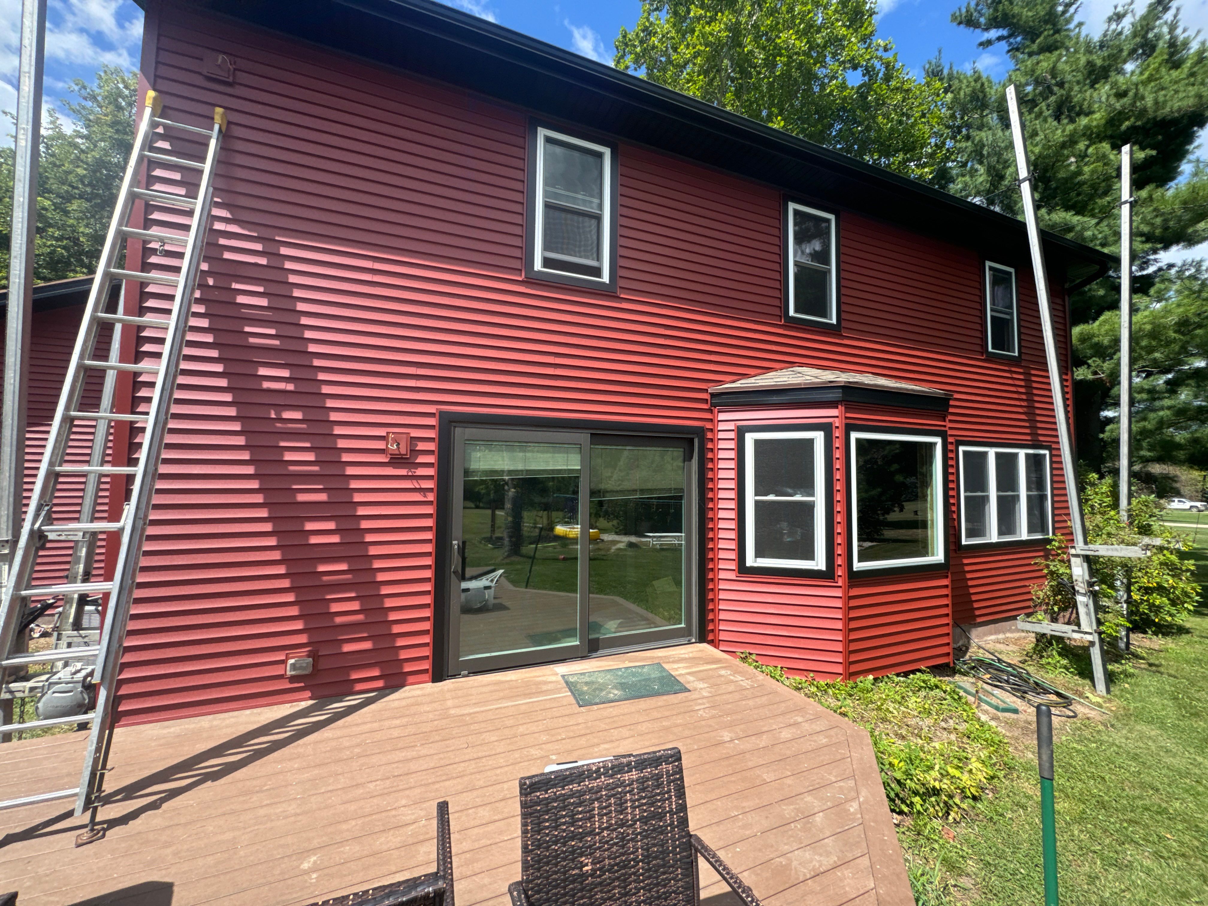 Vinyl Window & Siding Project in rand Ledge by 42 North Construction, LLC.
