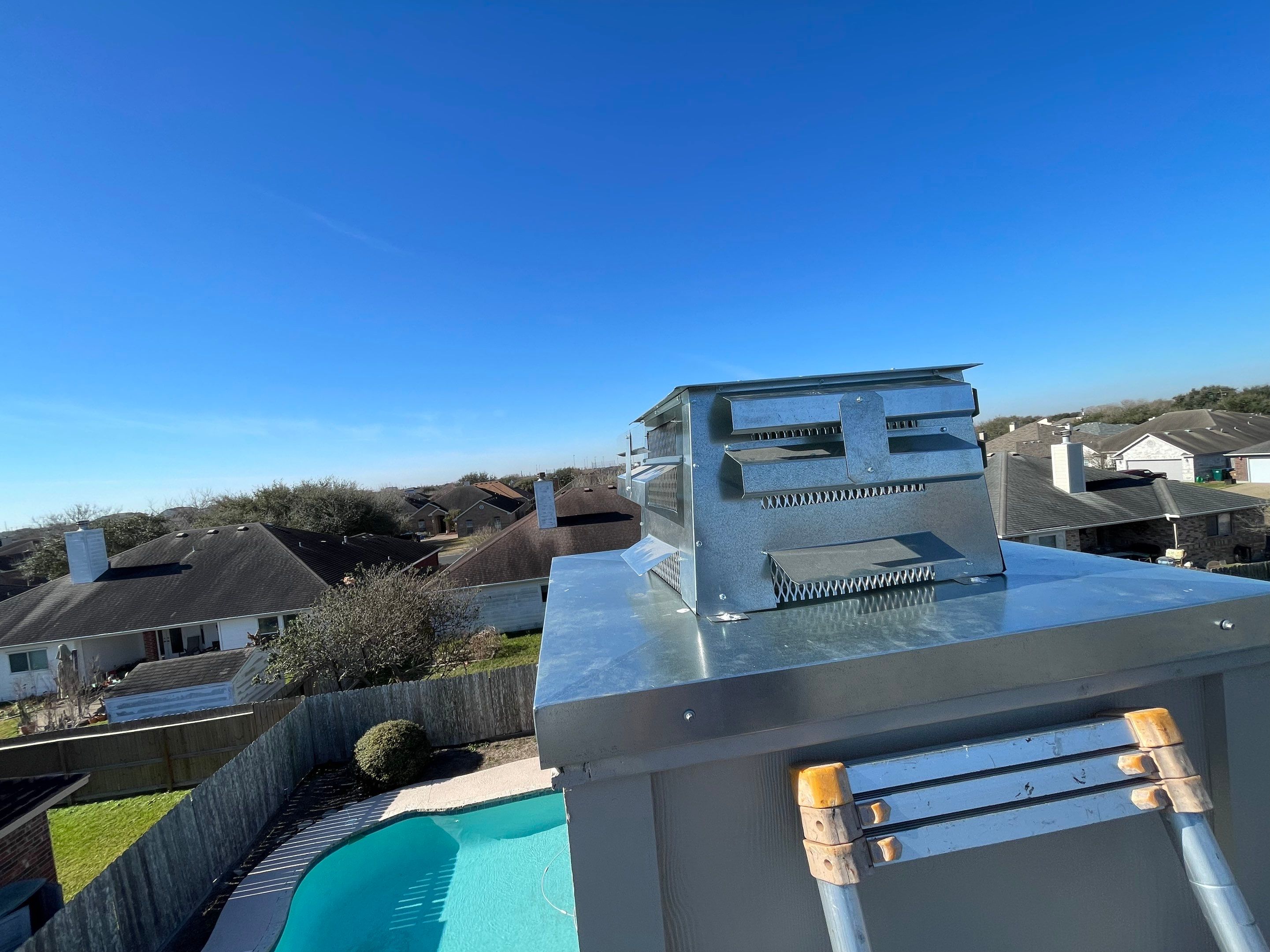 Residential Roofing Repair Replacing Chimney Cap by Lighthouse Roofing