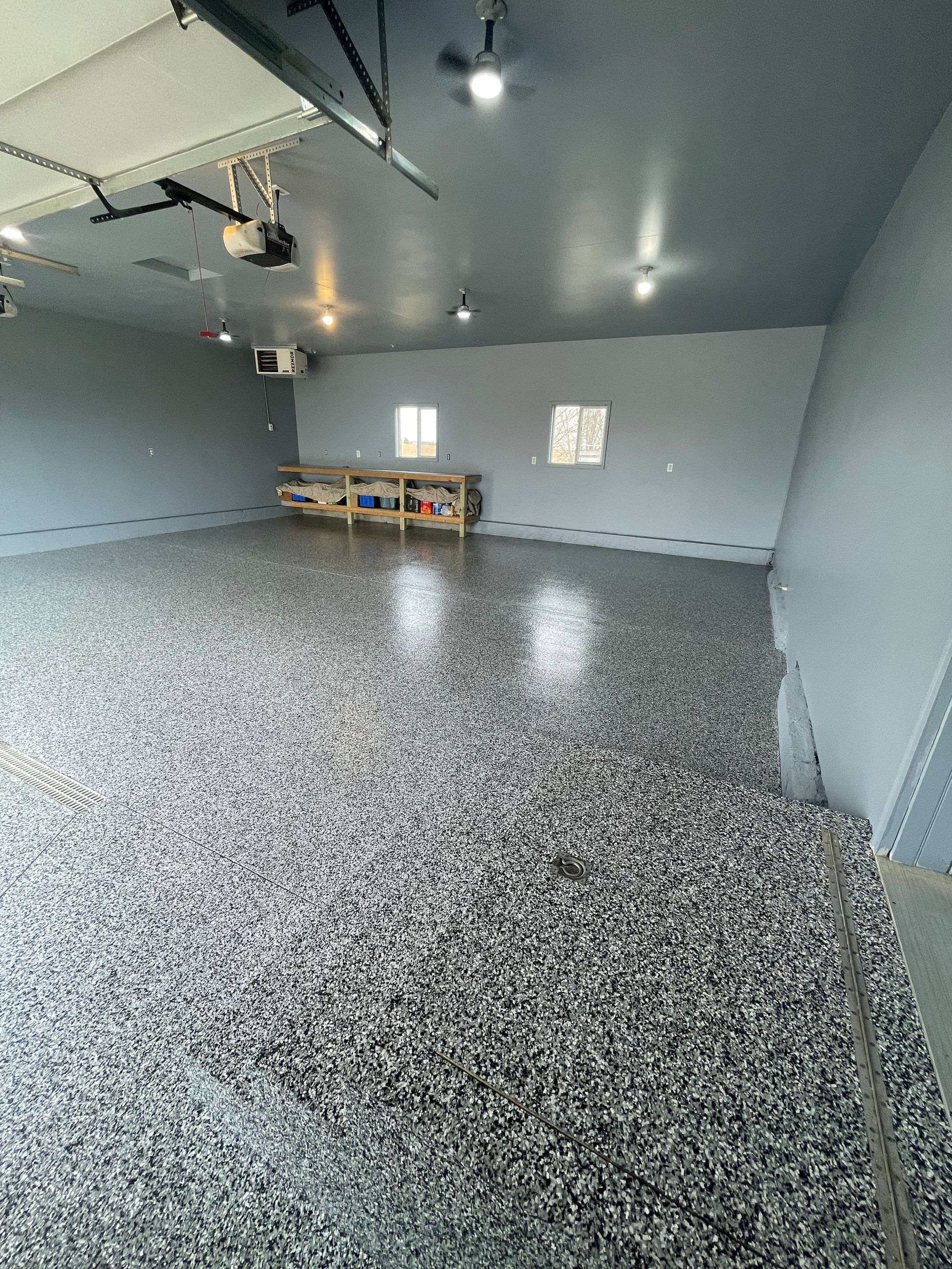 Grey Granite-Style Garage Floor Coating and Stairs in Hartford by Select Painting, Coatings & Garage Cabinets
