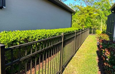 Aluminum Fence Installation using Black 3 Rail Aluminum Fence