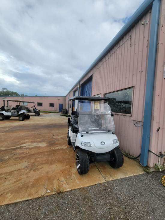 Black Aluminum Gutters with Matching Downspouts in Port Charlotte, FL by Gutter Professors