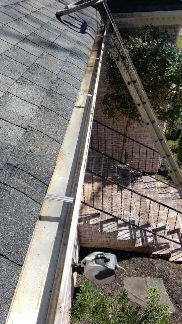 Gutter Cleaning using water by G&H Home Tech Pros LLC
