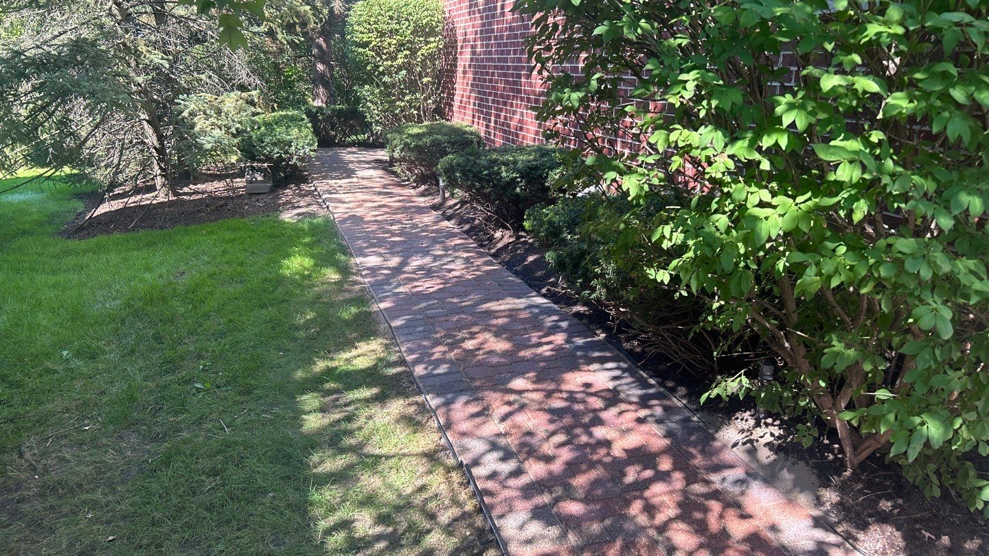 Brick paver repair, clean and seal by Northern Power Washing LLC.