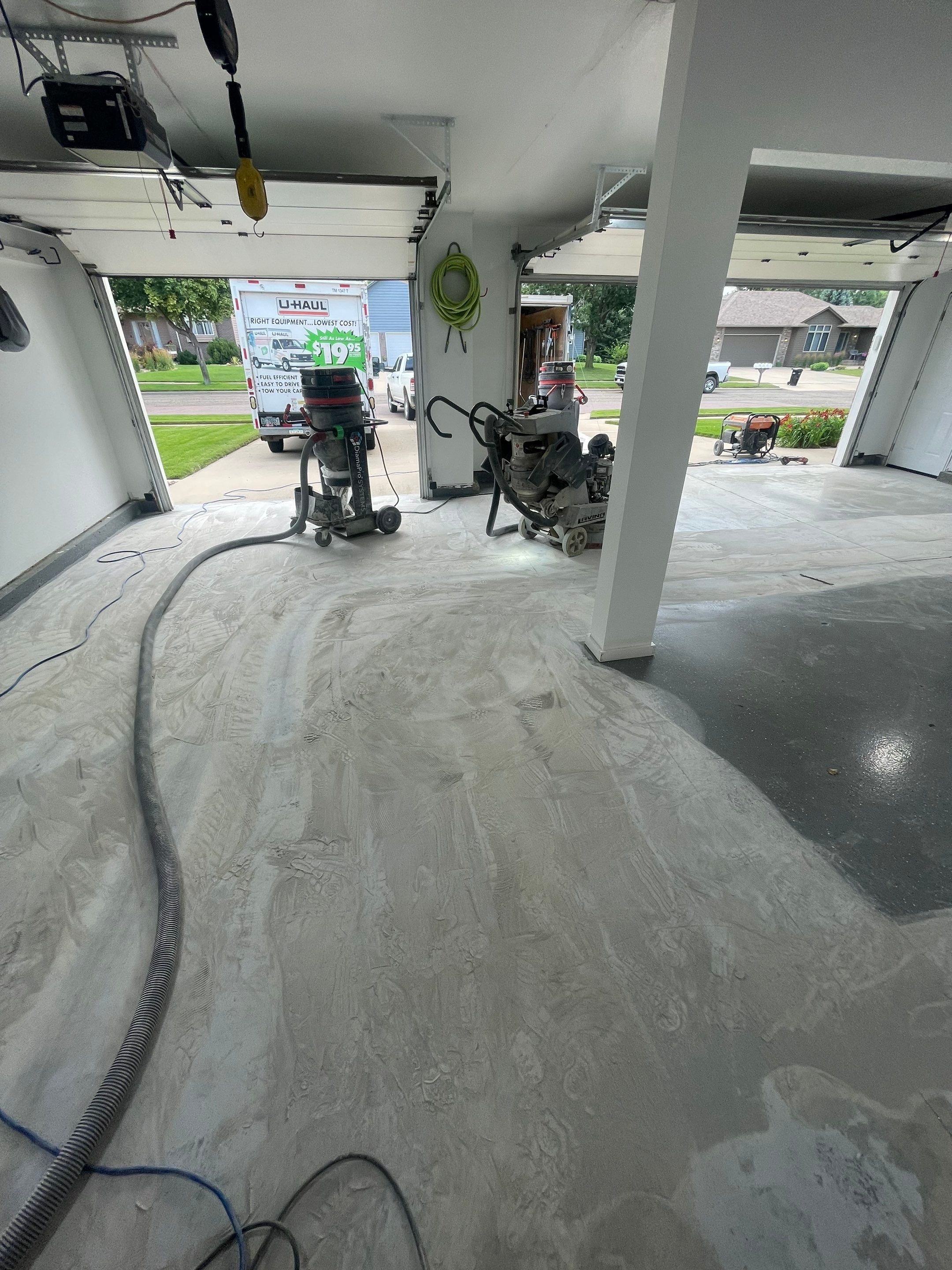 Multi-Car Garage Concrete Coating with Coyote Flake Finish in Sioux Falls by Select Painting, Coatings & Garage Cabinets
