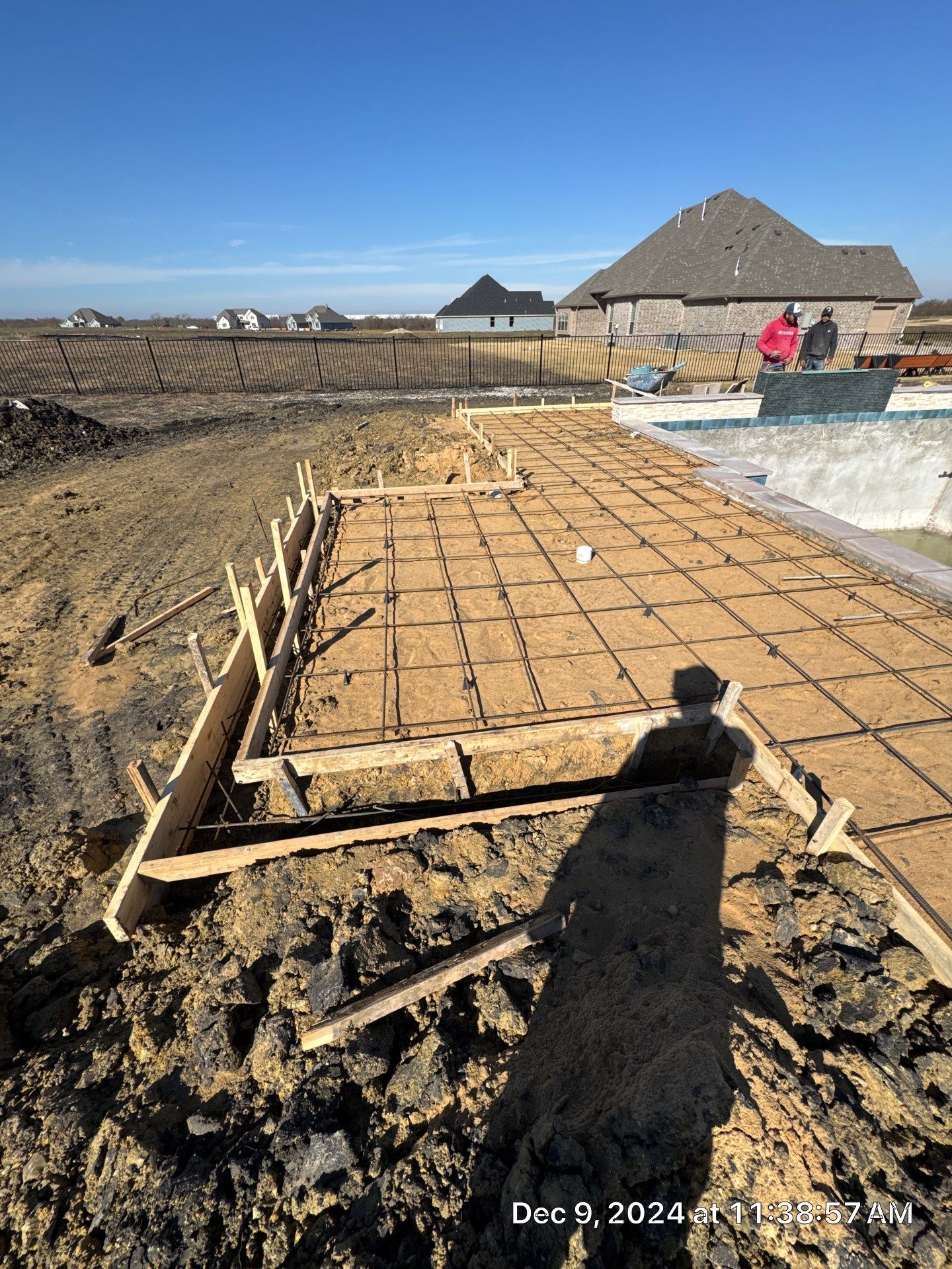 Geometric Pool with Raised Water-Feature Wall and Pergola by Pinnacle Pools and Spas - DFW