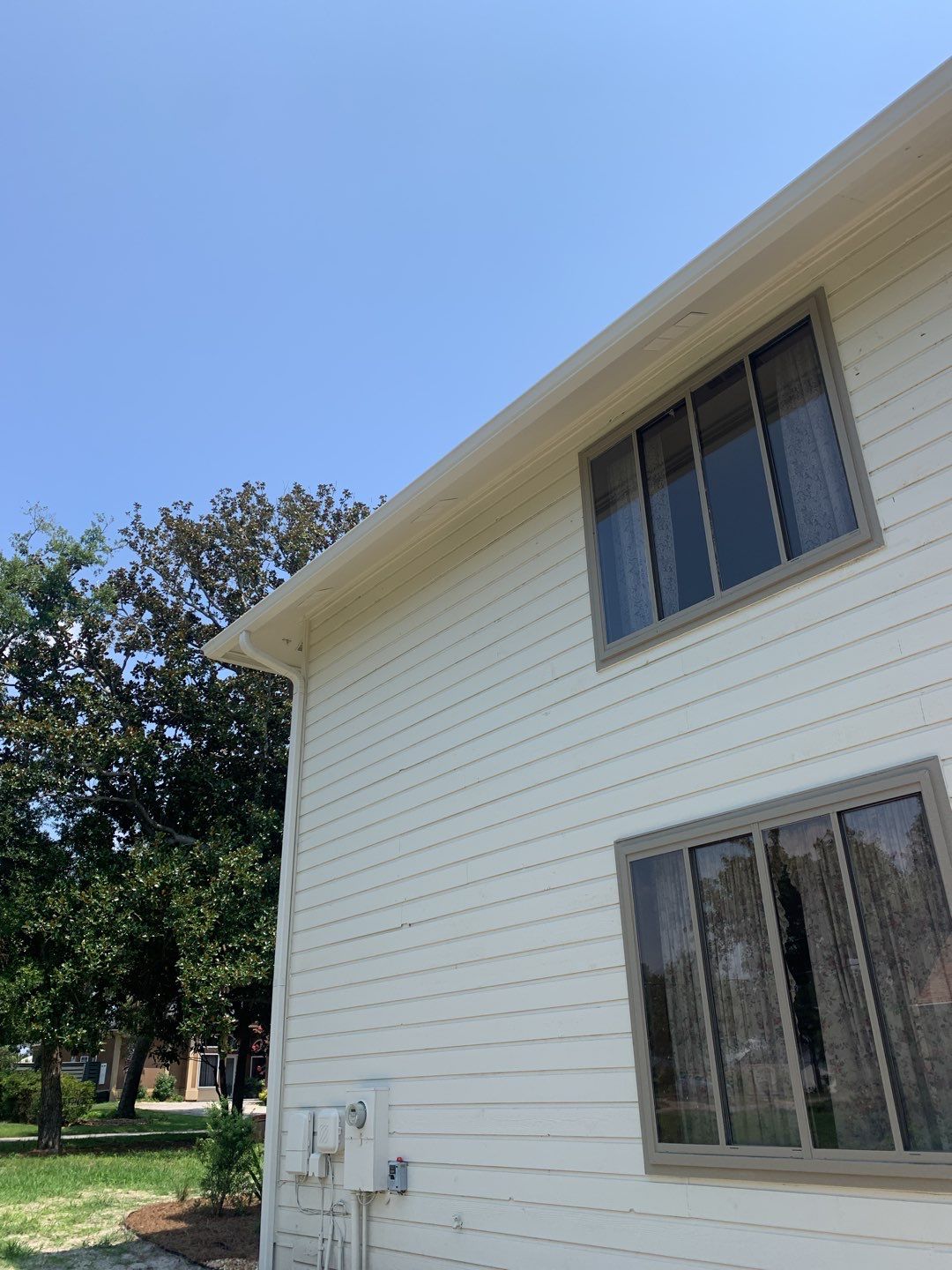 Heavy-Duty Commercial Downspouts in Panama City Beach FL by Gutter Professors