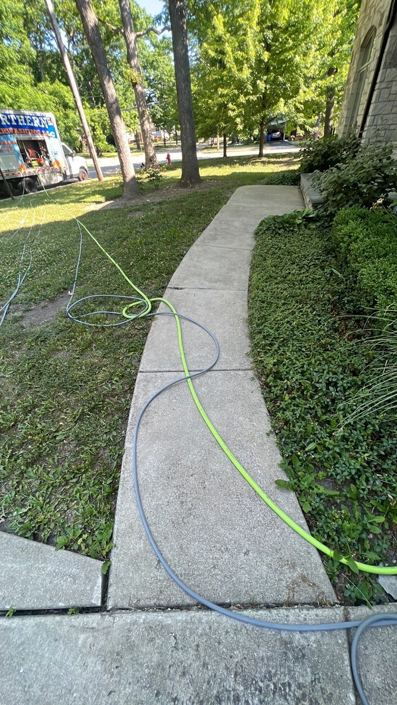 Highland Park, IL Bluestone, concrete,  Trex deck cleaning by Northern Power Washing LLC.