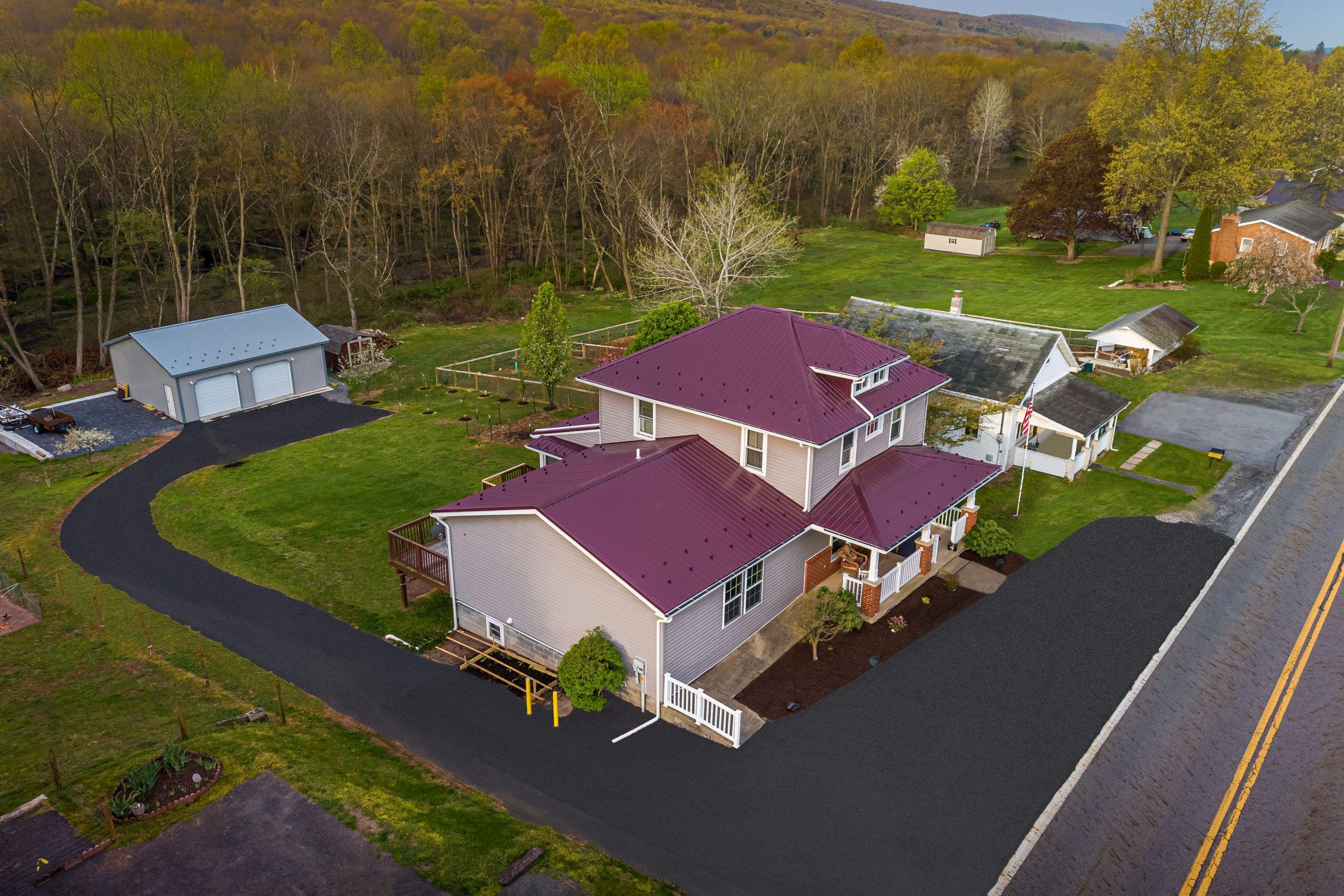 Metal Roof-burgundy by Esh Builders