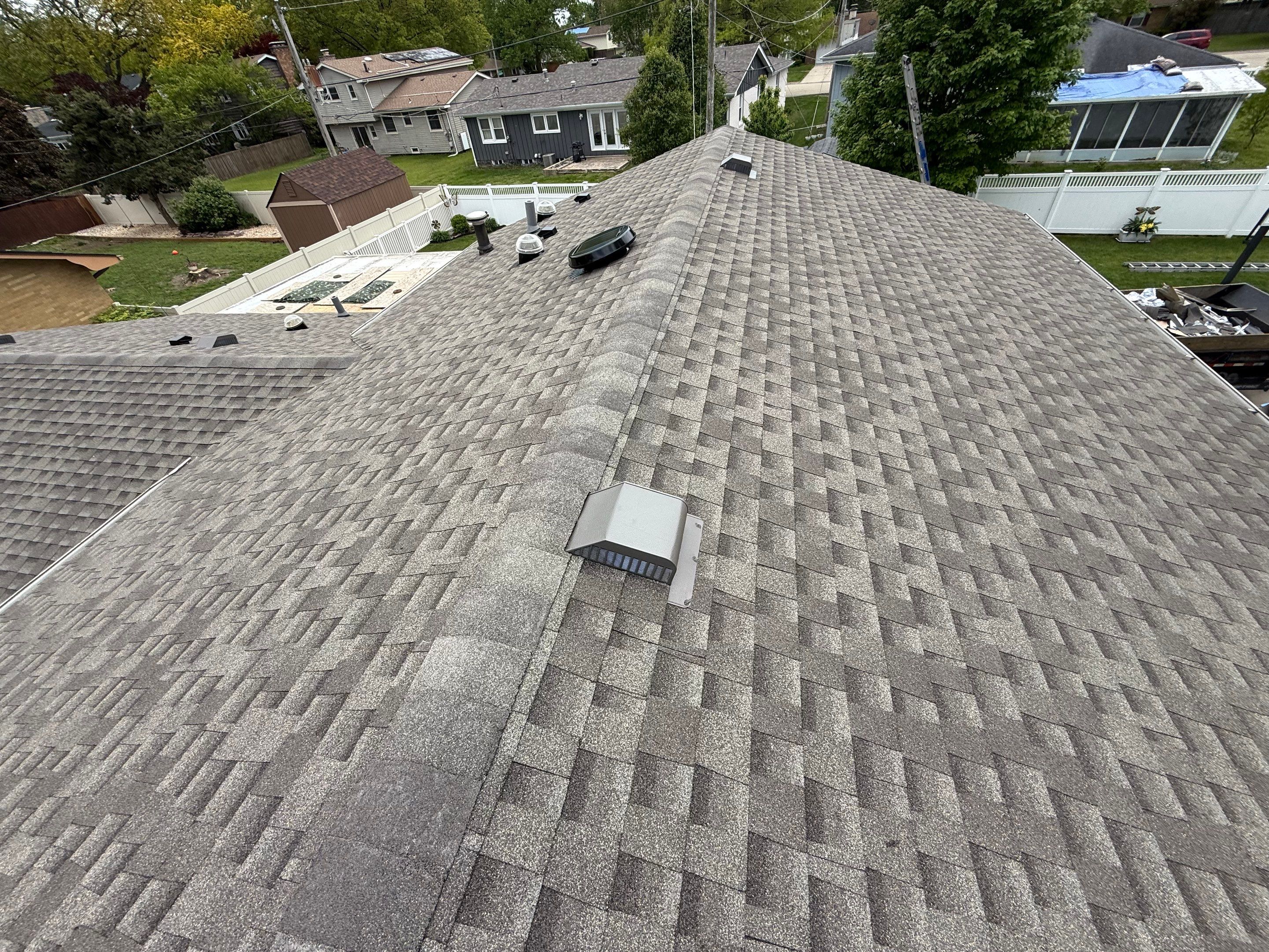 Roof, gutters, windows & siding replacement by Optimal Home Improvement 