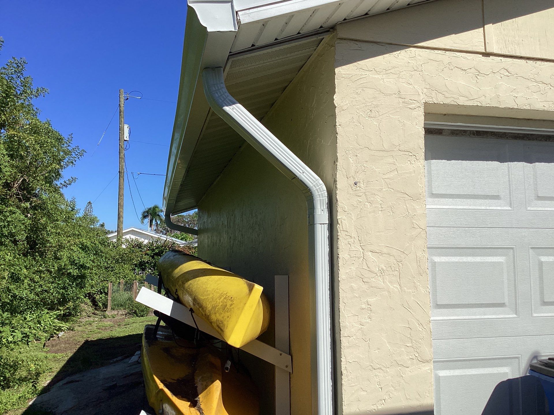 3x4 Downspouts and Seamless Gutters for Coastal Homes in St James City FL by Gutter Professors