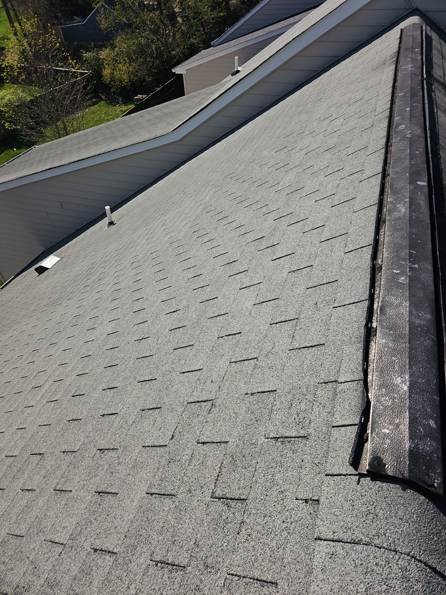 Roof Replacement - Moire Black by Winchester Roofing