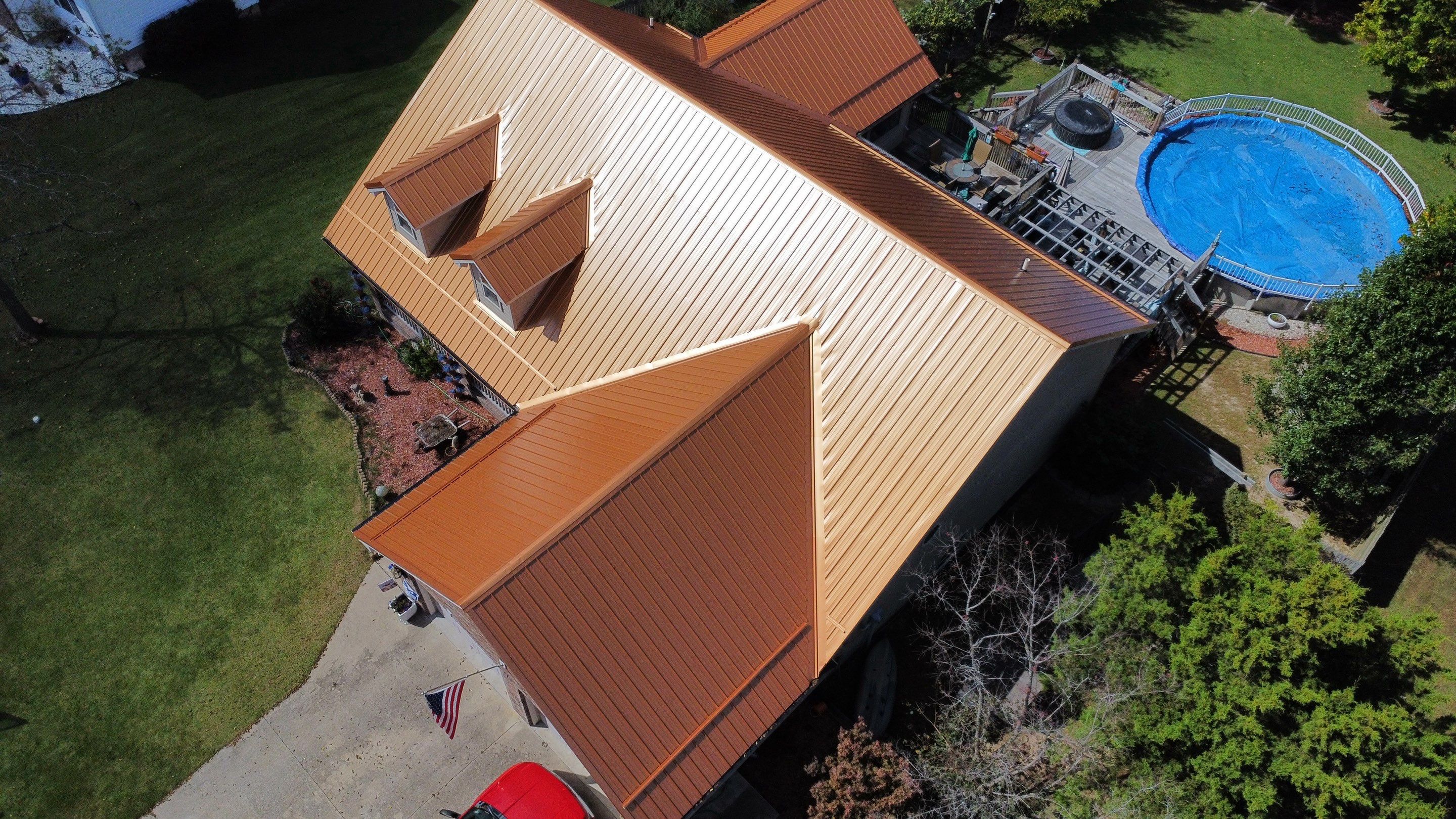 Residential Roofing Install - Copper 29 Guage G-Rib Metal & 6" Inch Seamless Gutters + 3"x4" Aluminum Downspouts by Titan Commercial & Residential Roofing